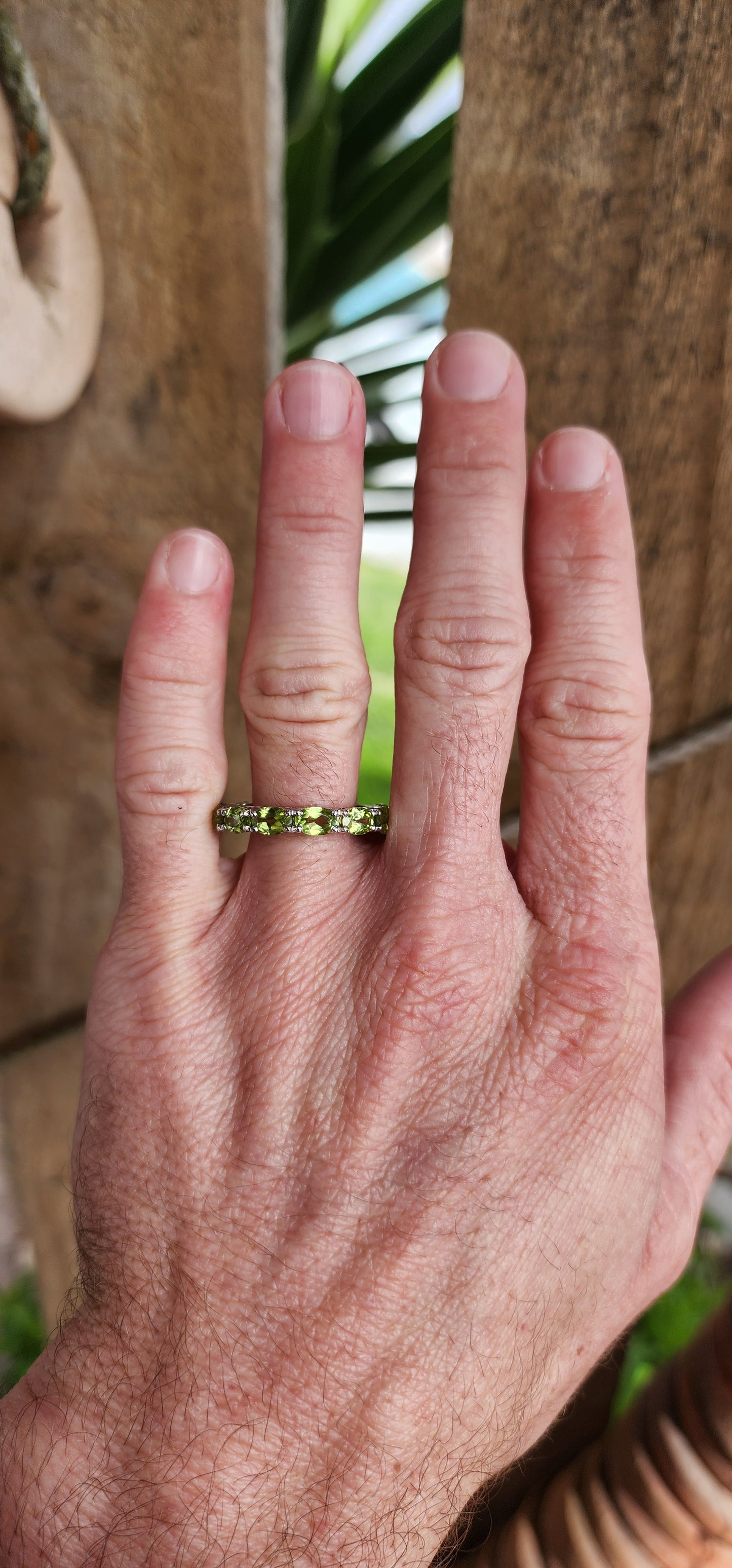 Sterling Silver and Faceted Oval cut Green Peridot Full Eternity ring.
