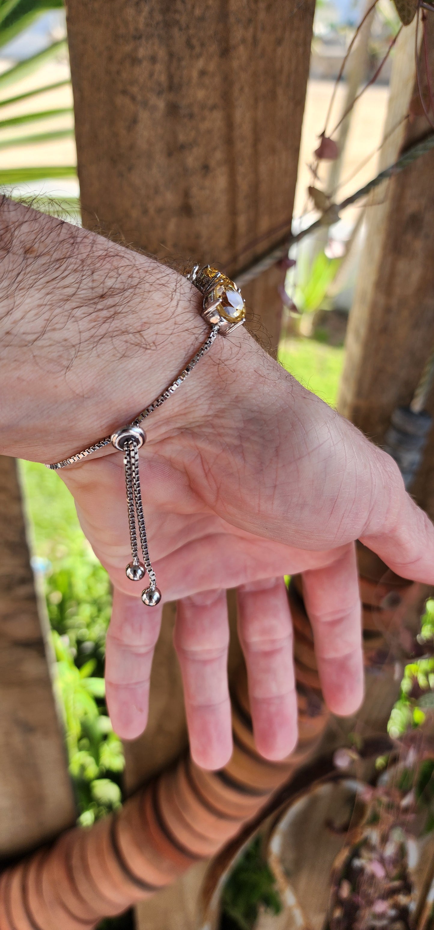 This gorgeous and STATEMENT Tennis style bracelet is crafted in Sterling Silver and features 9x large sized Oval Faceted Cut Yellow Citrine Gemstones.