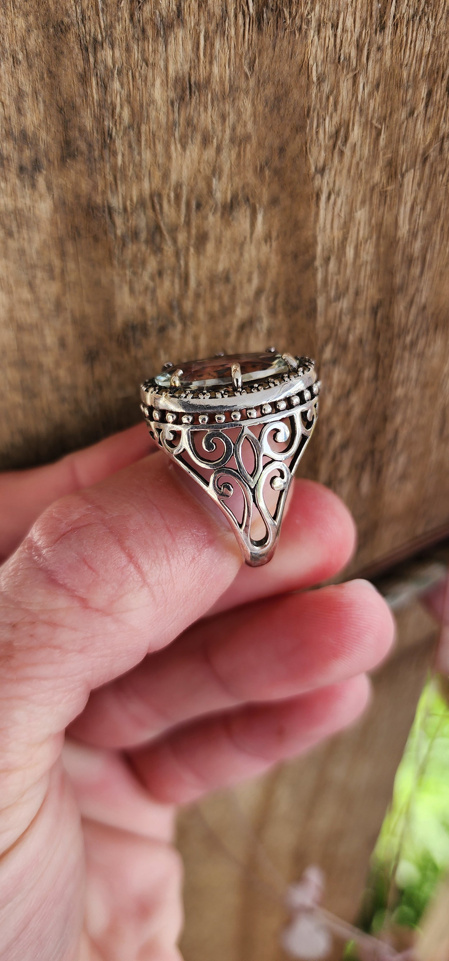 Exquisite and chunky Sterling Silver Cocktail/Dress ring featuring an lovely claw-set light Green Oval Cut Prasiolite Gemstone in an sparkly Marcasite Haló border.
