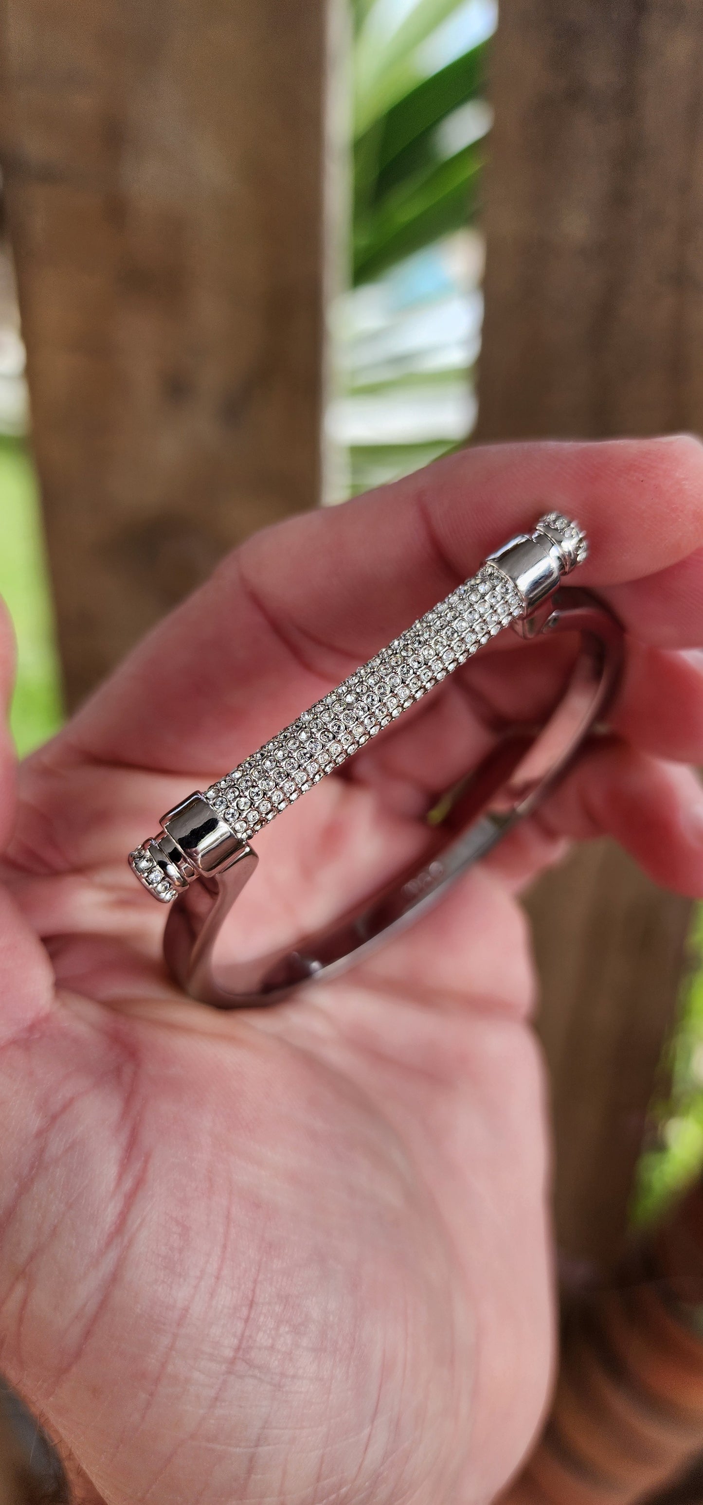 Swarovski Silvertone "Friend" narrow Manetta bangle/bracelet.
Rhodium-plated bracelet with pavé white Swarovski crystals.