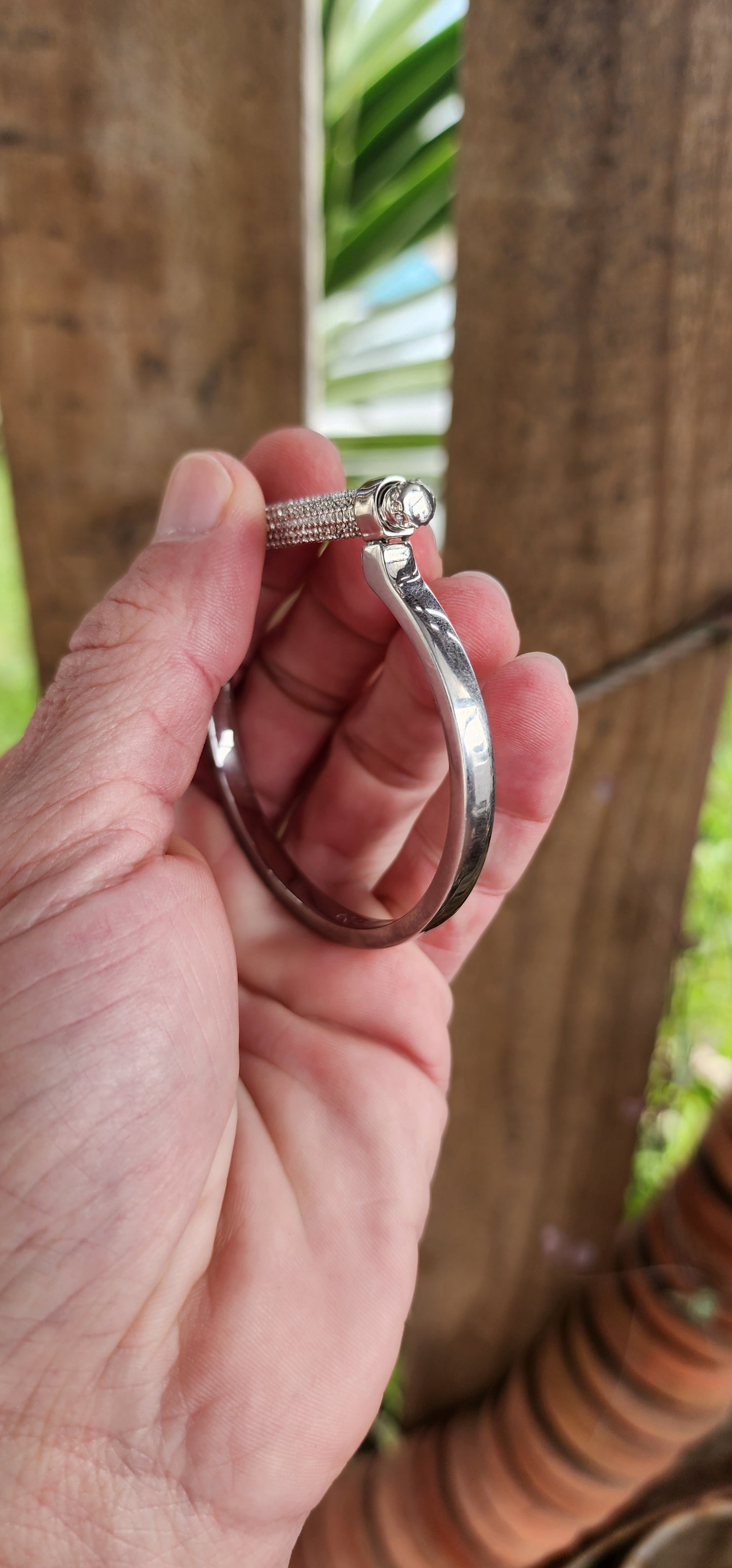 Swarovski Silvertone "Friend" narrow Manetta bangle/bracelet.
Rhodium-plated bracelet with pavé white Swarovski crystals.