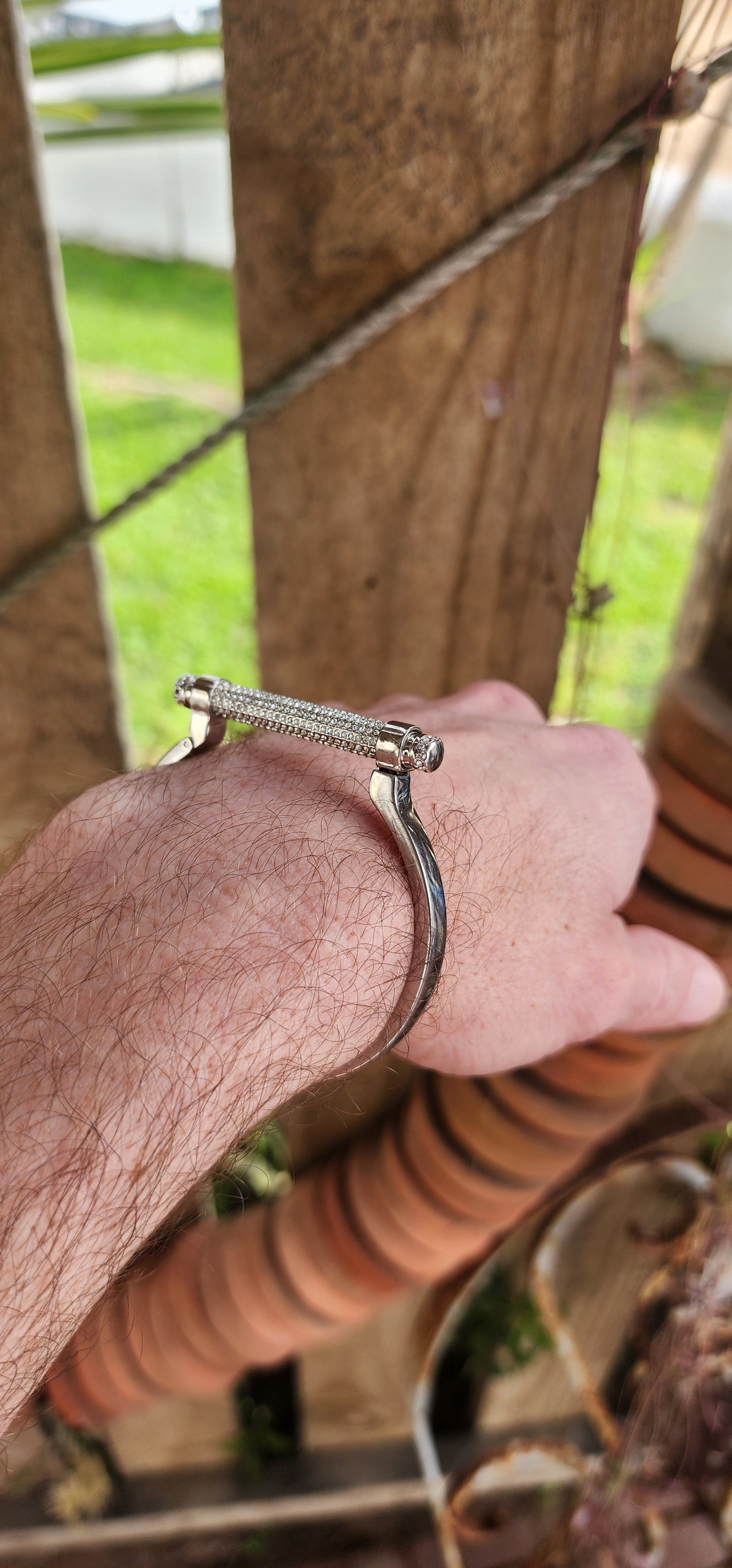 Swarovski Silvertone "Friend" narrow Manetta bangle/bracelet.
Rhodium-plated bracelet with pavé white Swarovski crystals.