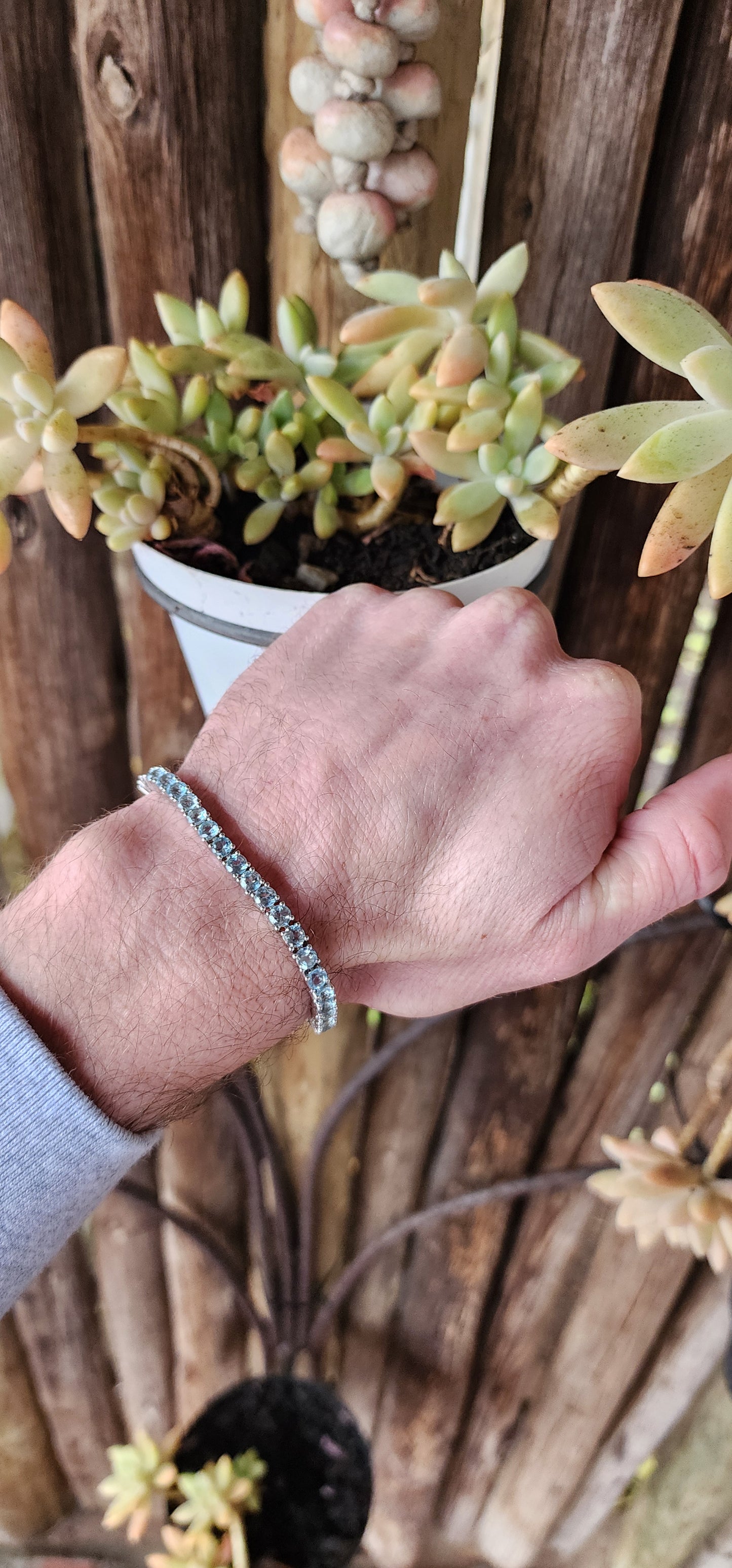 Sterling Silver and 37x Faceted Round cut Natural Sky Blue Topaz Gemstones Tennis bracelet.