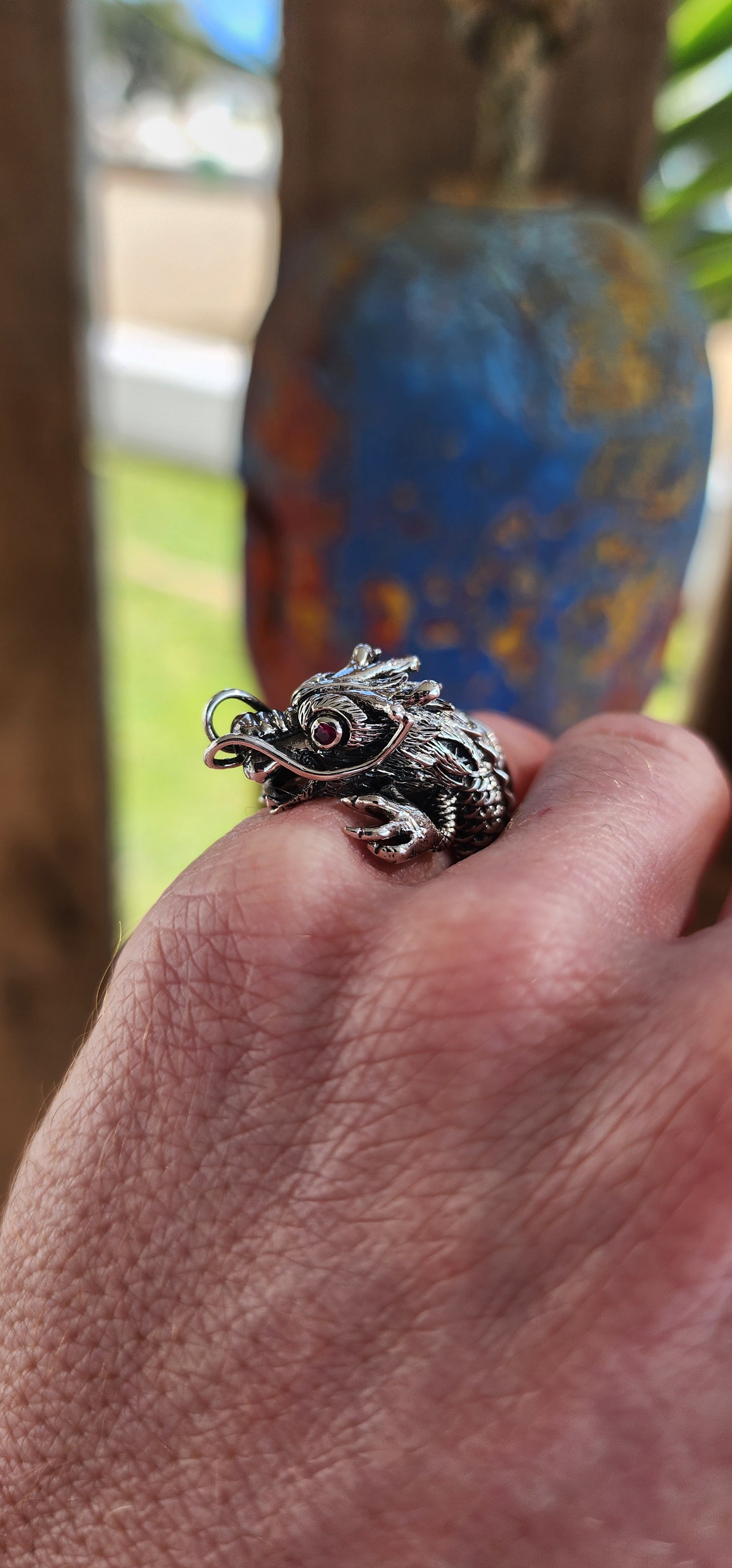 This chunky statement Sterling Silver Red Eye Dragon Novelty Ring draws inspiration from Oriental and Gothic styles, making it a truly eye-catching beauty.