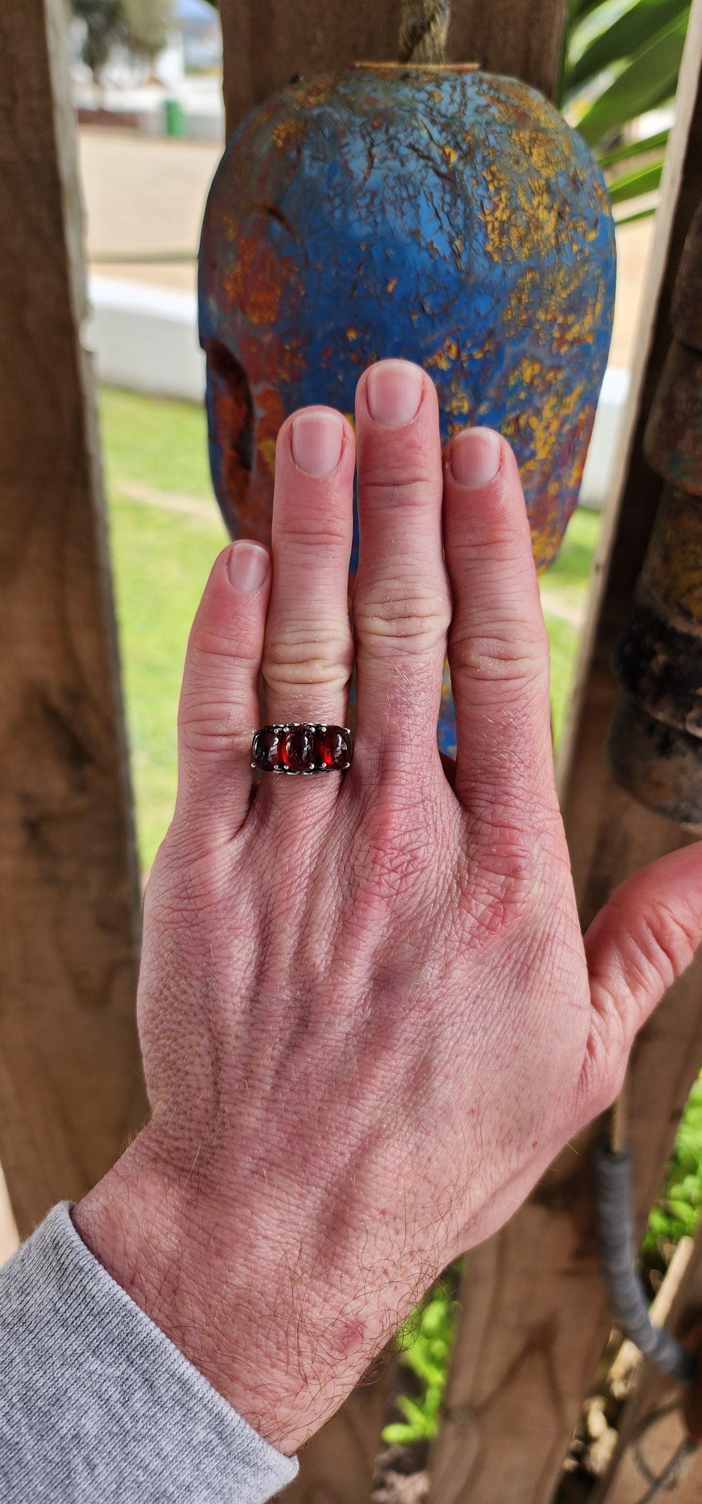 JELLY BABY!!Beautiful Sterling Silver and prong set Oval Garnet Cabochons Trilogy ring.
The little pierced Hearts on the sides of this ring add that extra special touch.
