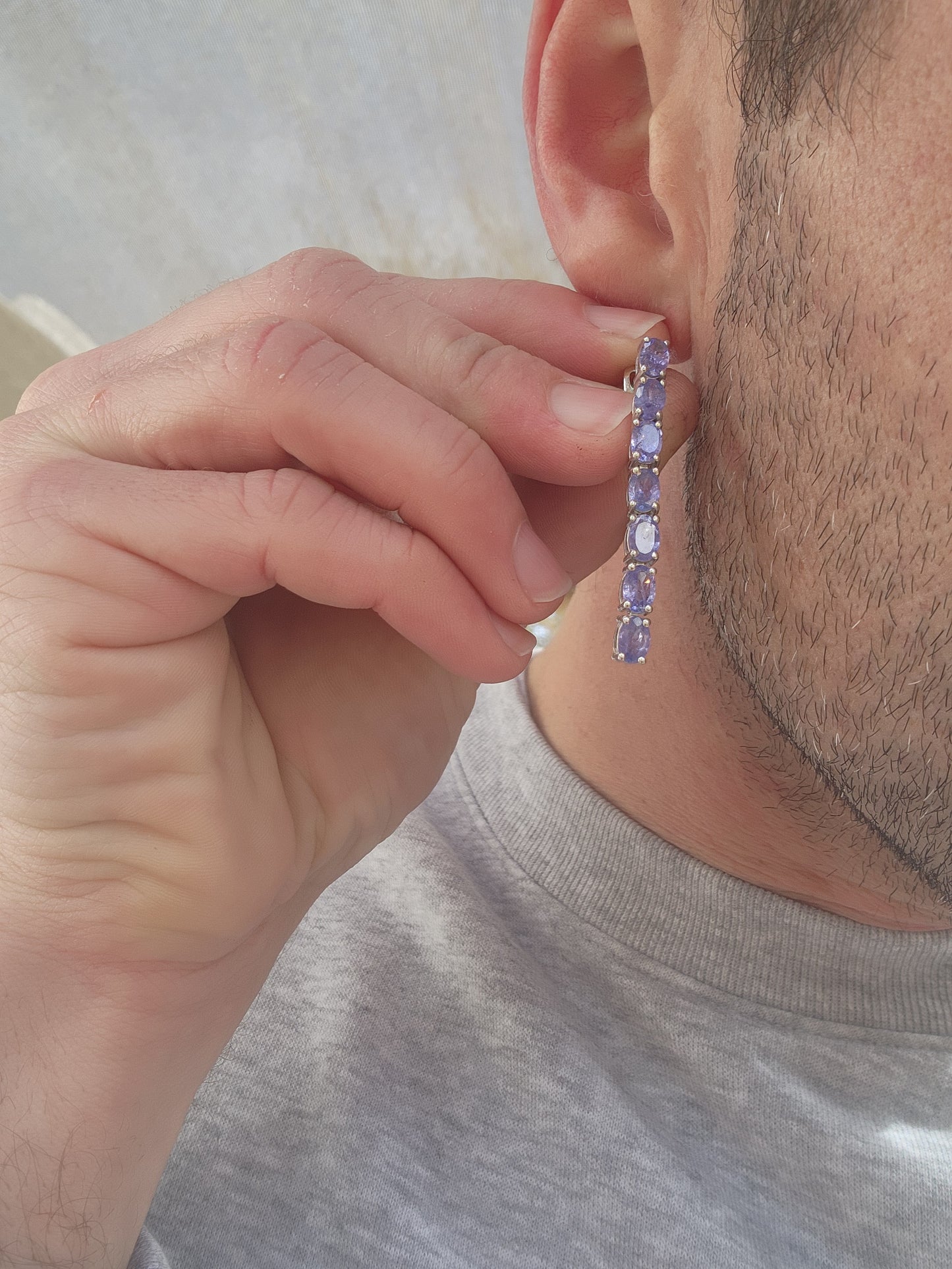 Stunning pair of Sterling Silver and Tanzanite Gemstones Articulated drop earrings.