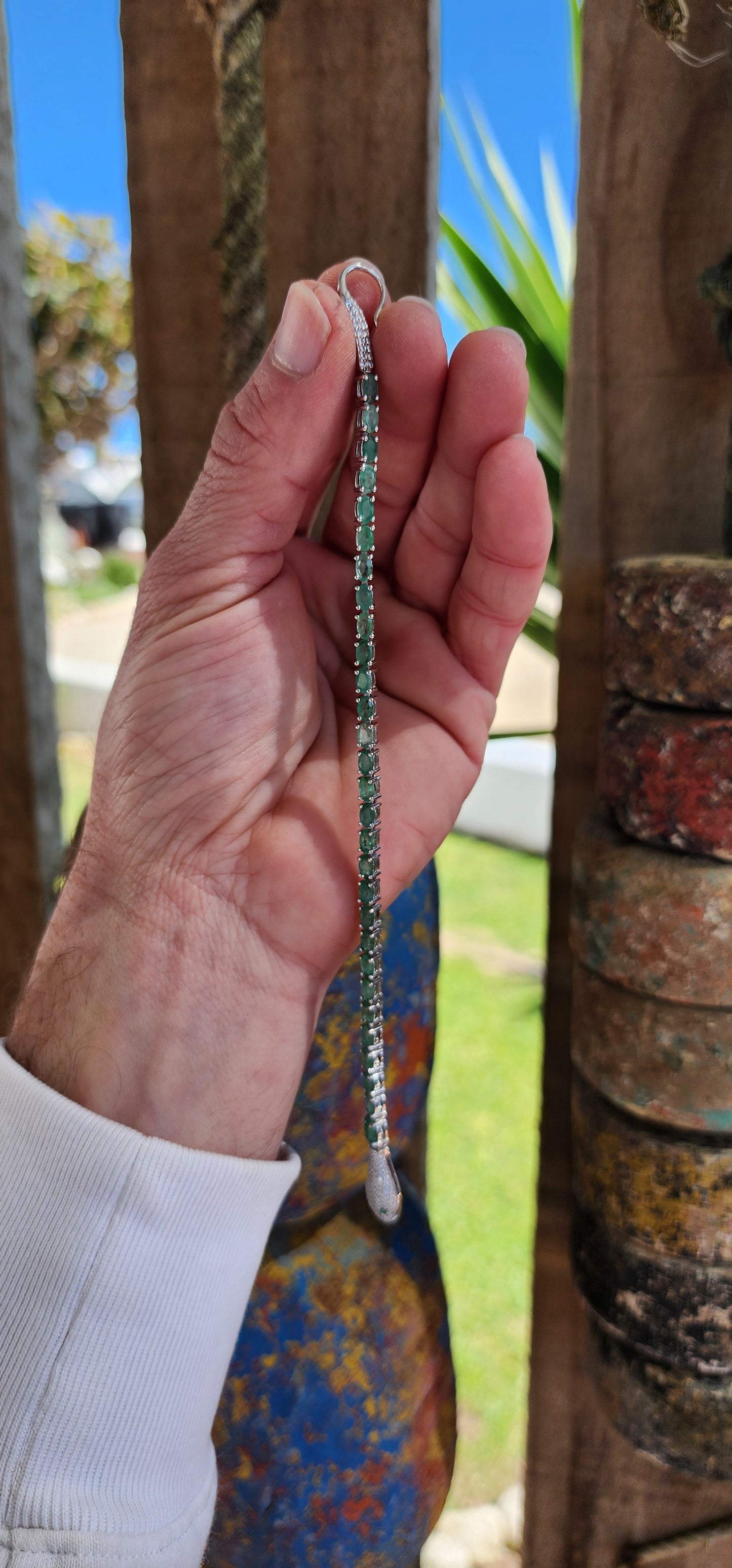 Thia incredible Serpent bracelet is a real piece of jewelry art! The bracelet is made of high quality Sterling Silver and Natural Oval cut Emerald Gemstones.