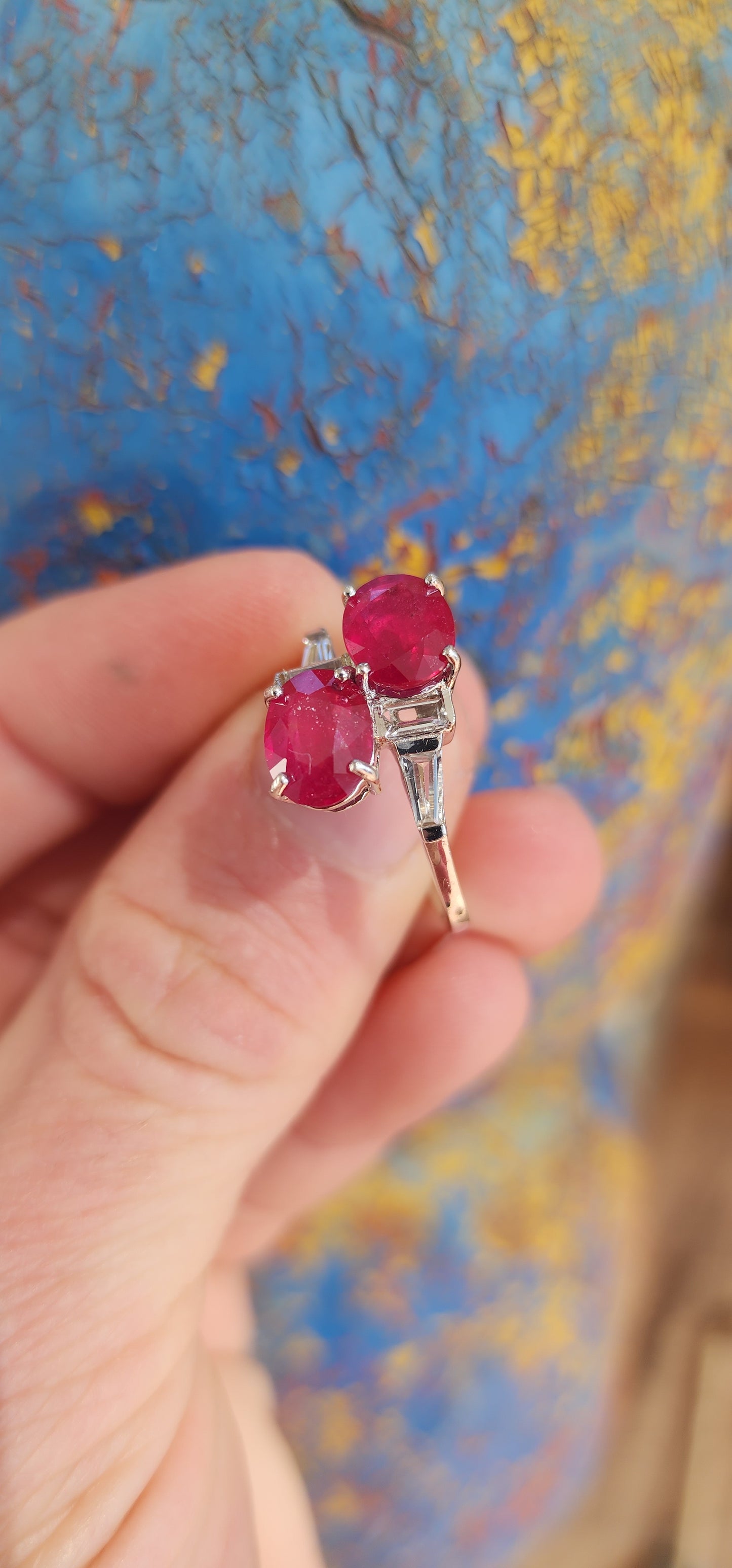 Beyond gorgeous, this trilogy style Oval cut Rubellite Tourmaline ring studded with Baguette cut CZ Gemstones along the Sterling Silver band would make a divine engagement ring.