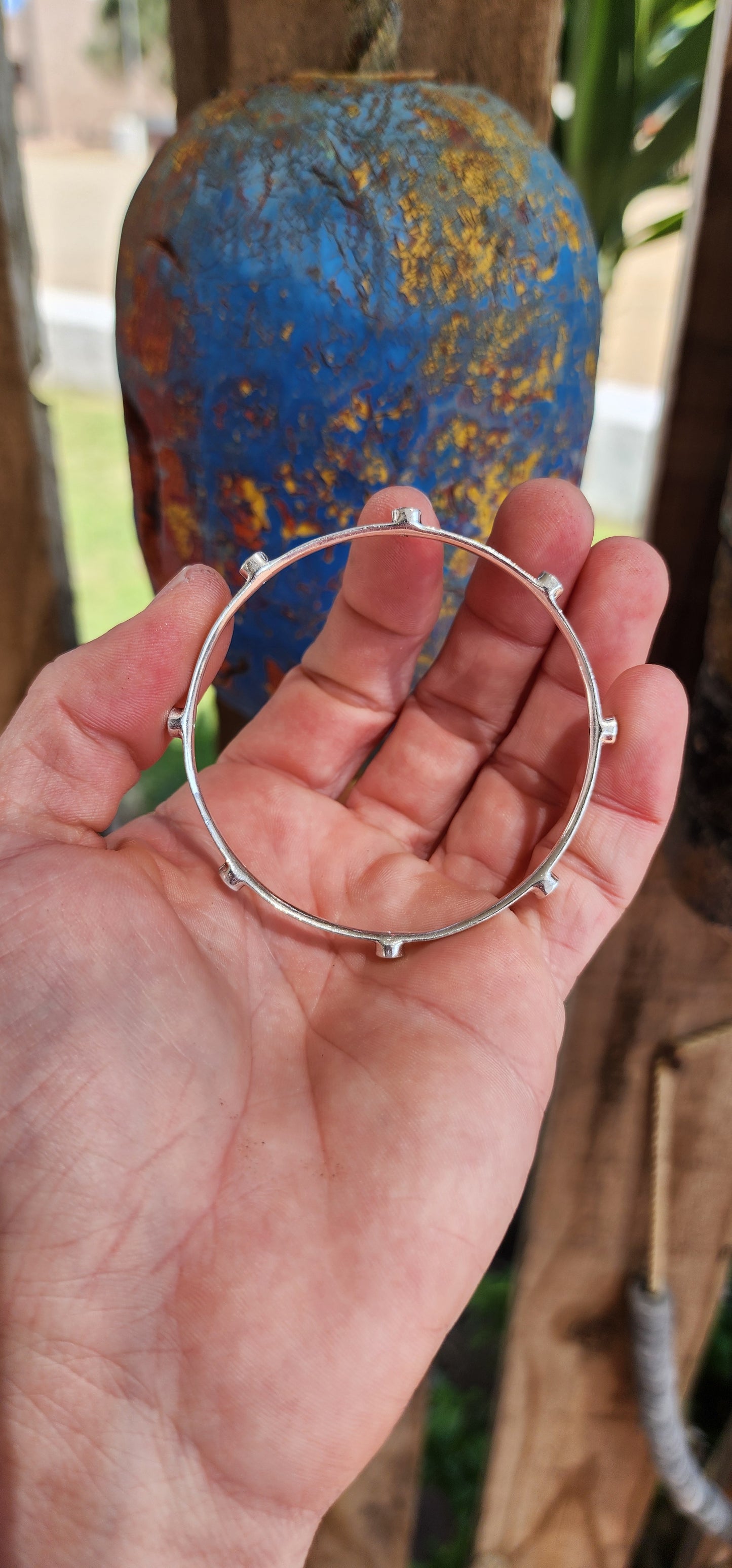 This stylish Sterling Silver flat band bangle will be a perfect addition to your wrist-mess collection!