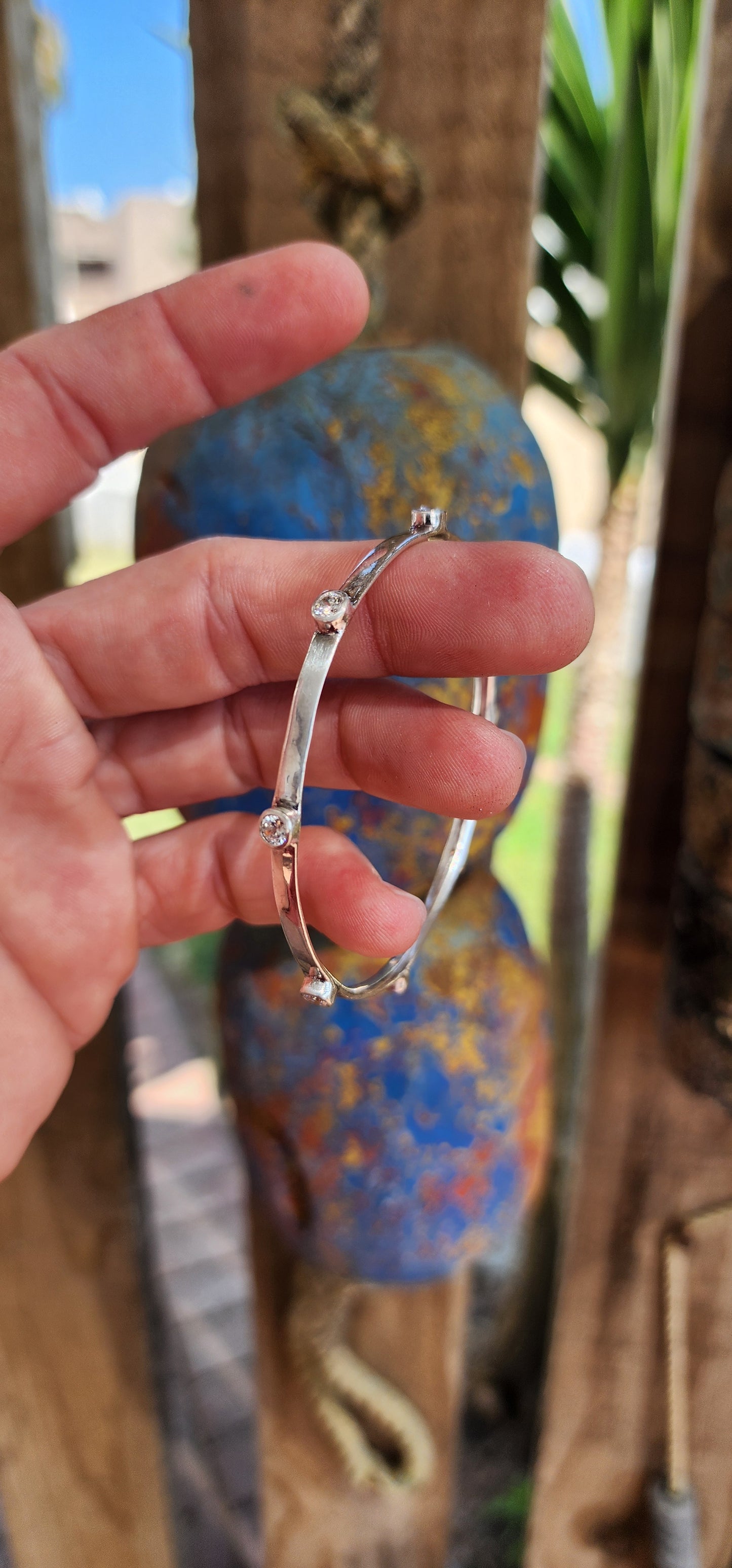 This stylish Sterling Silver flat band bangle will be a perfect addition to your wrist-mess collection!