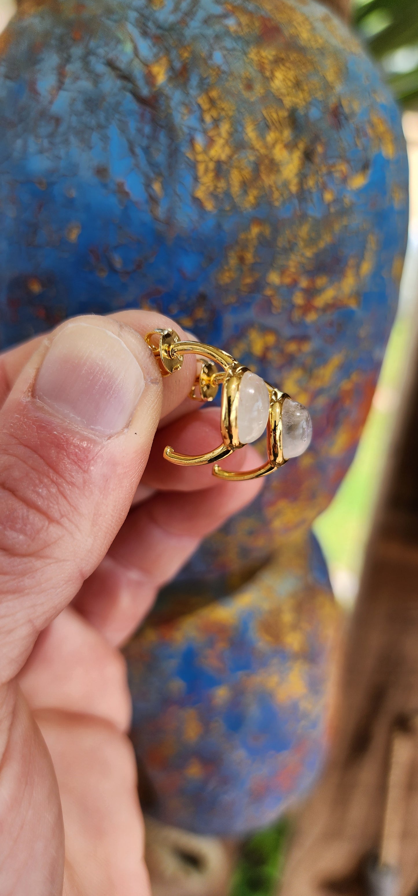 These are absolutely fantastic !! A pair of half hoop stud earrings with a modernistic design, made of Sterling Silver and plated with 18ct Yellow Gold. Each earring features a Oval cut Moonstone Cabochon set in a bezel/tube setting.