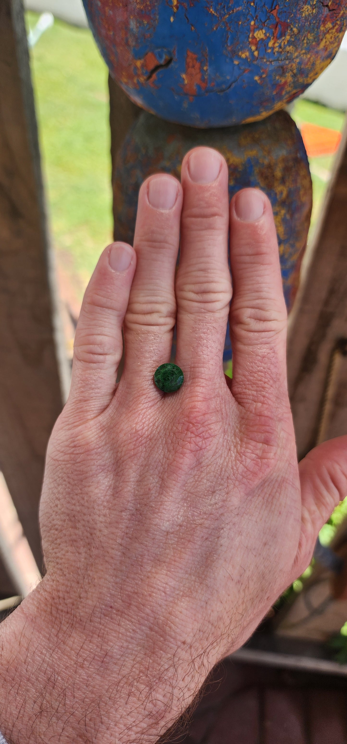 Natural unset, no treatment 4ct maw sit sit gemstone in a round cut with an opaque clarity.