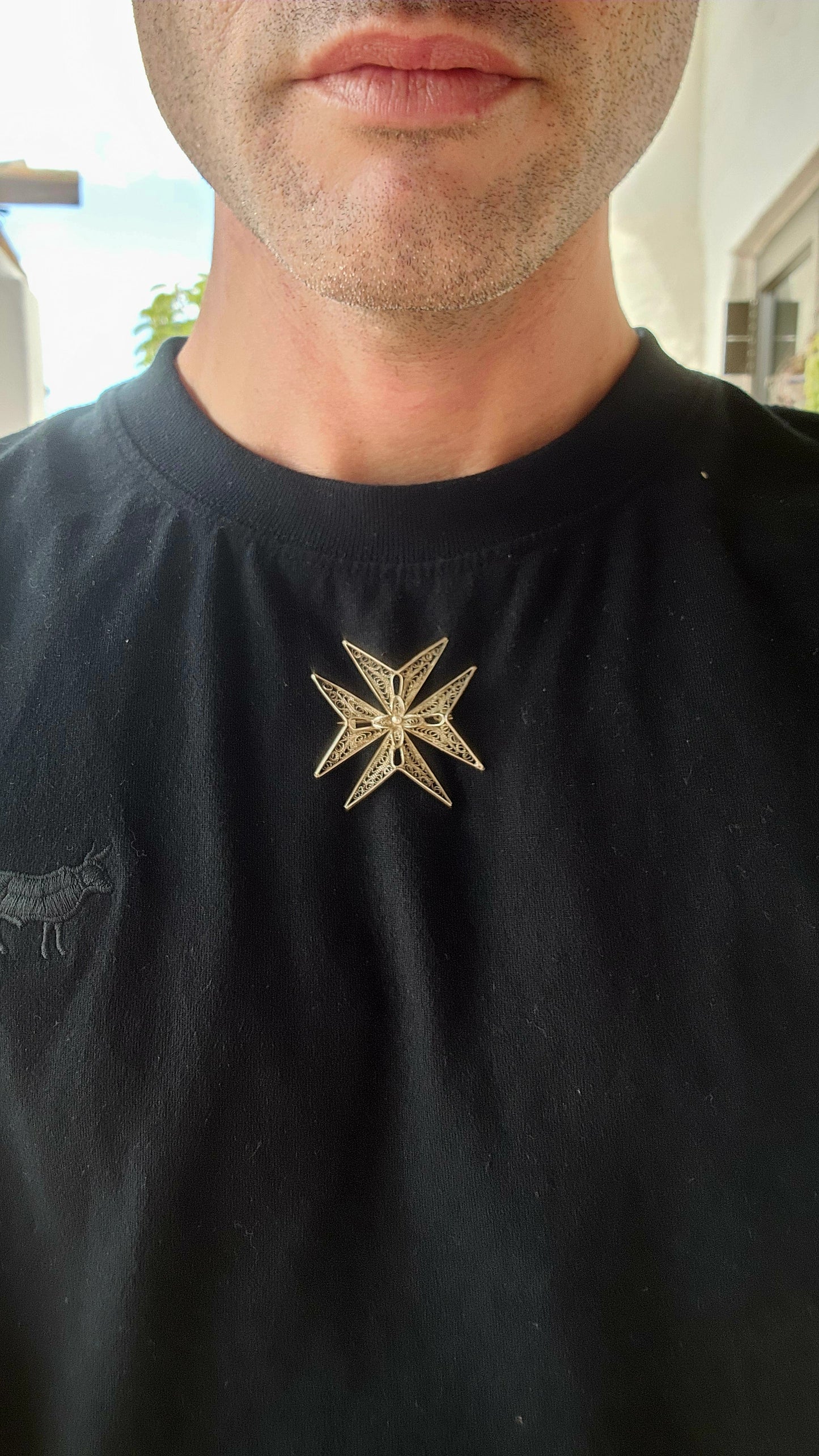 This vintage 800 silver Maltese cross brooch is a remarkable example of traditional Mediterranean jewelry-making, embodying both historical significance and exceptional craftsmanship.
