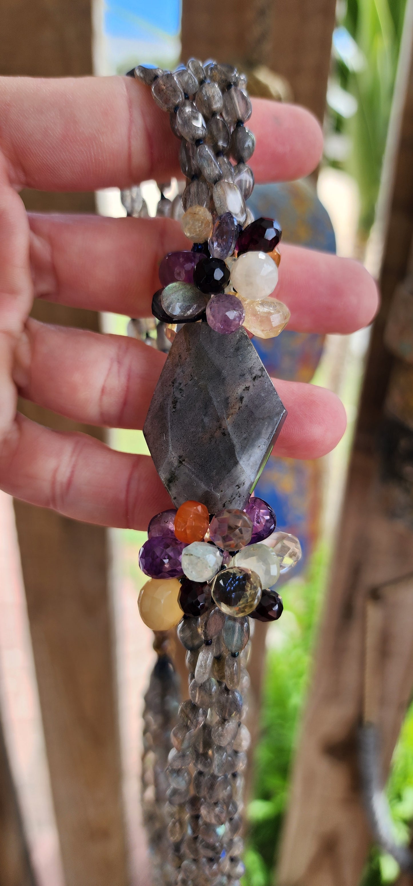 Wow !! This stunning extra length artisan-made necklace is a masterpiece that effortlessly blends the raw beauty of nature with exceptional craftsmanship.