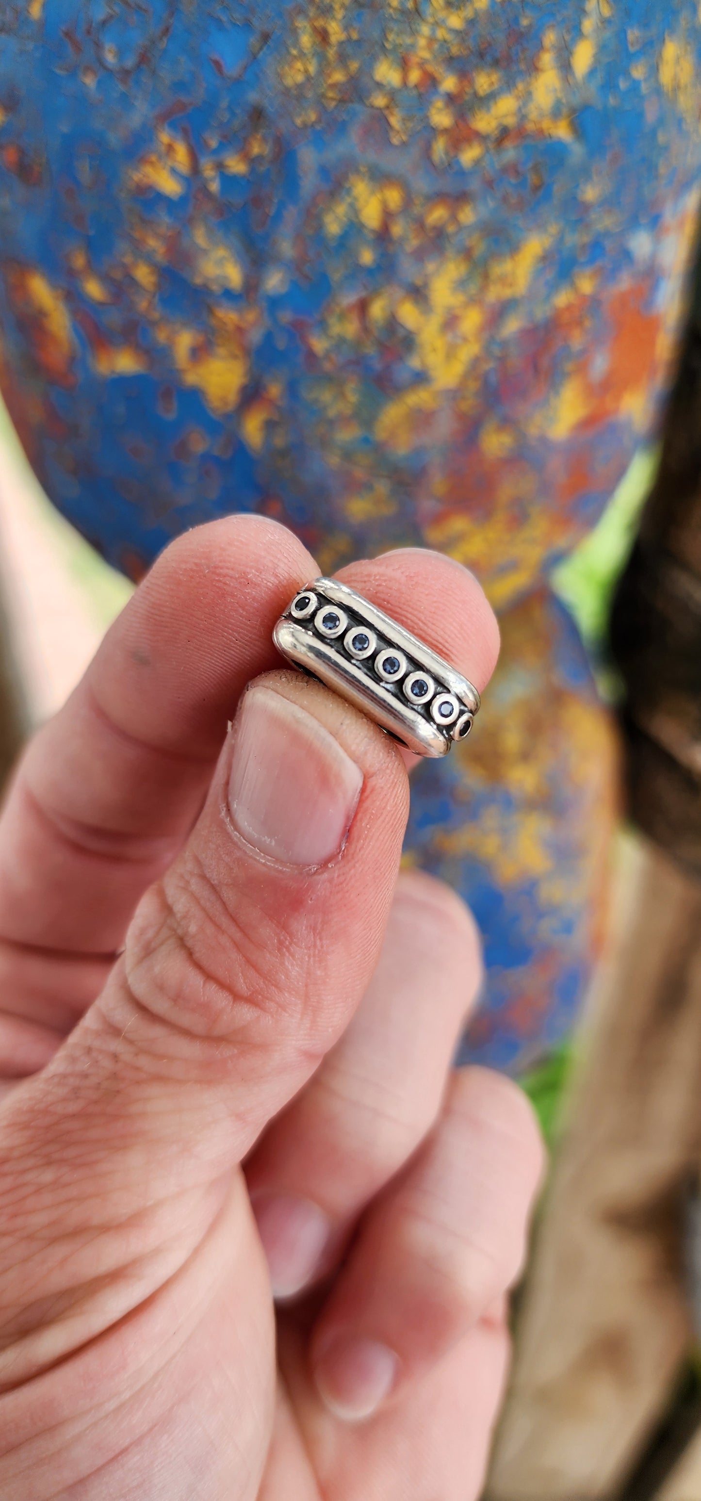 These are a pair of Pandora designer sterling silver bracelet clips "Double Diva", specifically designed to connect multiple bracelets.