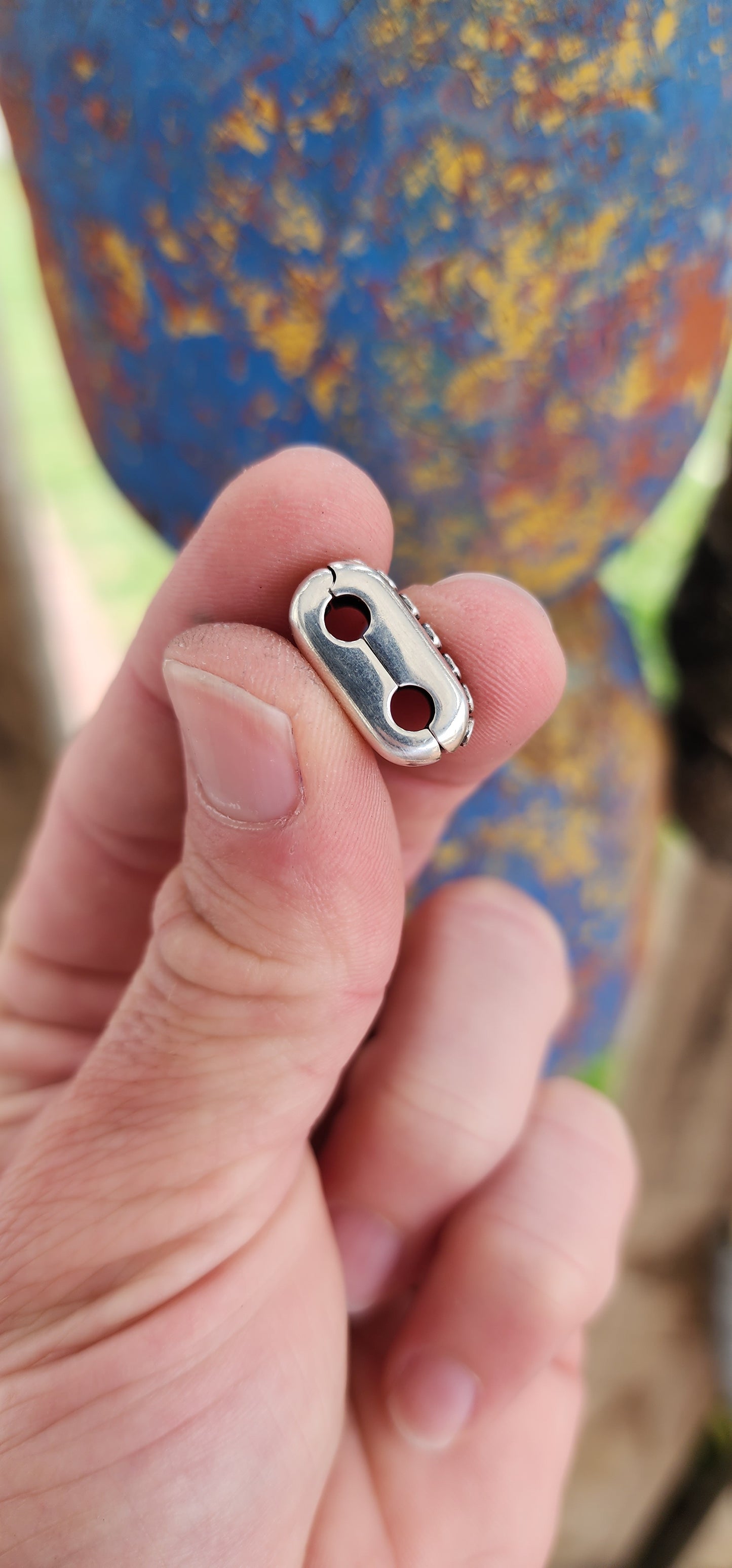 These are a pair of Pandora designer sterling silver bracelet clips "Double Diva", specifically designed to connect multiple bracelets.