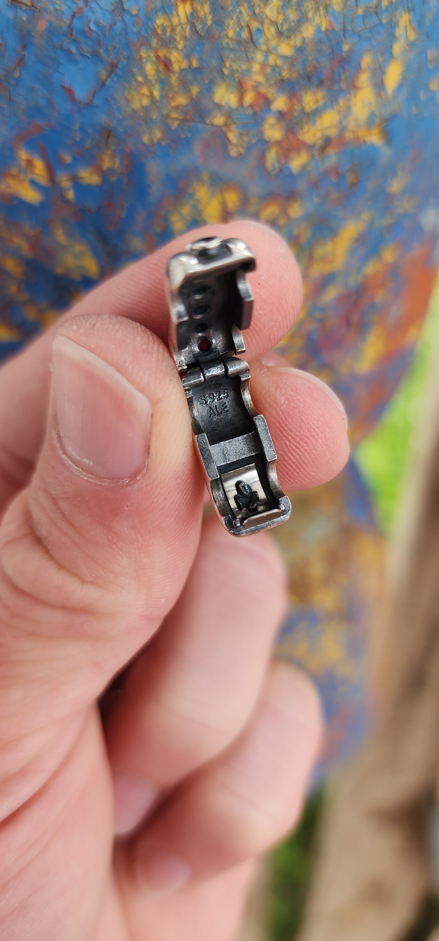 These are a pair of Pandora designer sterling silver bracelet clips "Double Diva", specifically designed to connect multiple bracelets.