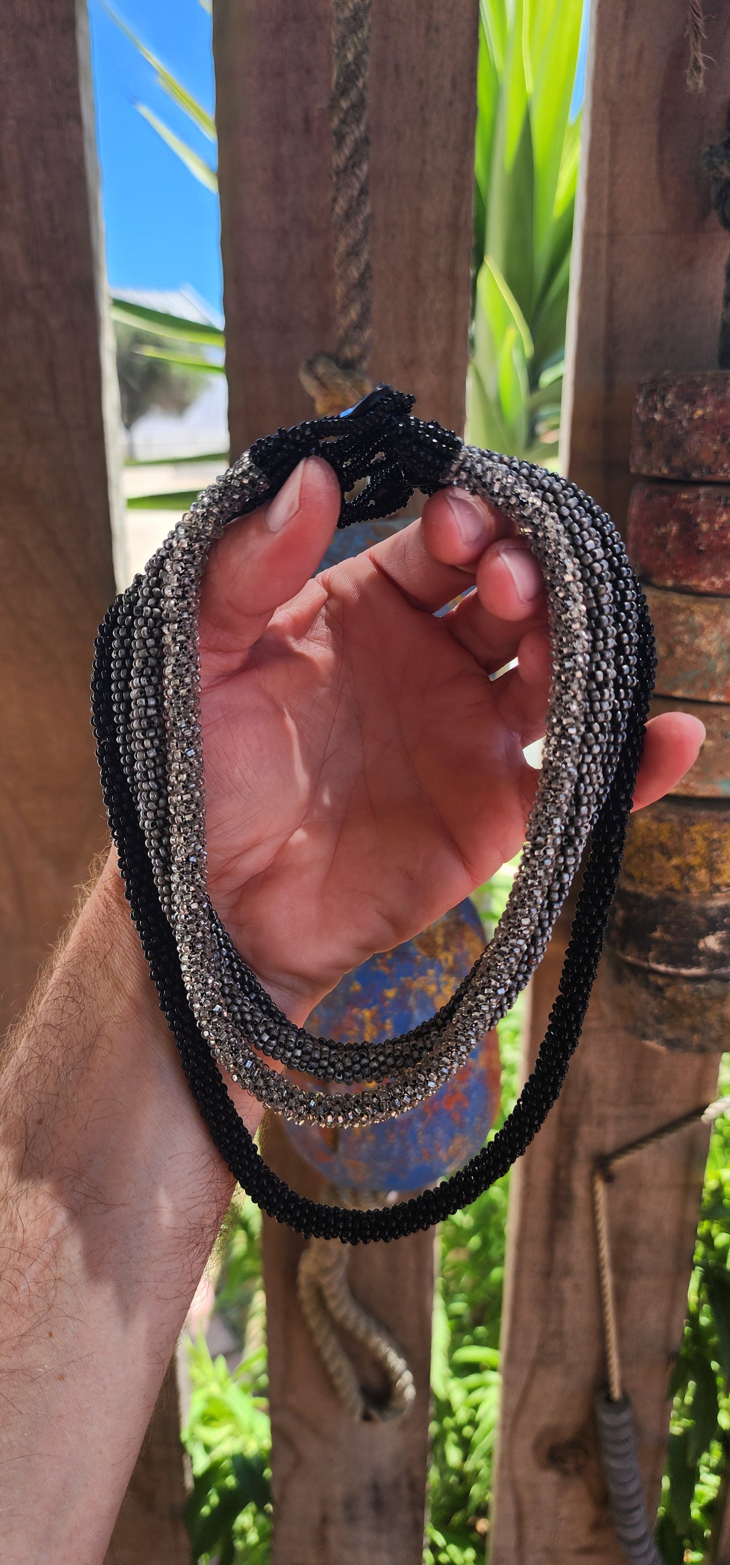 This stunning handcrafted choker necklace exemplifies artistry and meticulous craftsmanship, the result of countless hours of dedicated work.