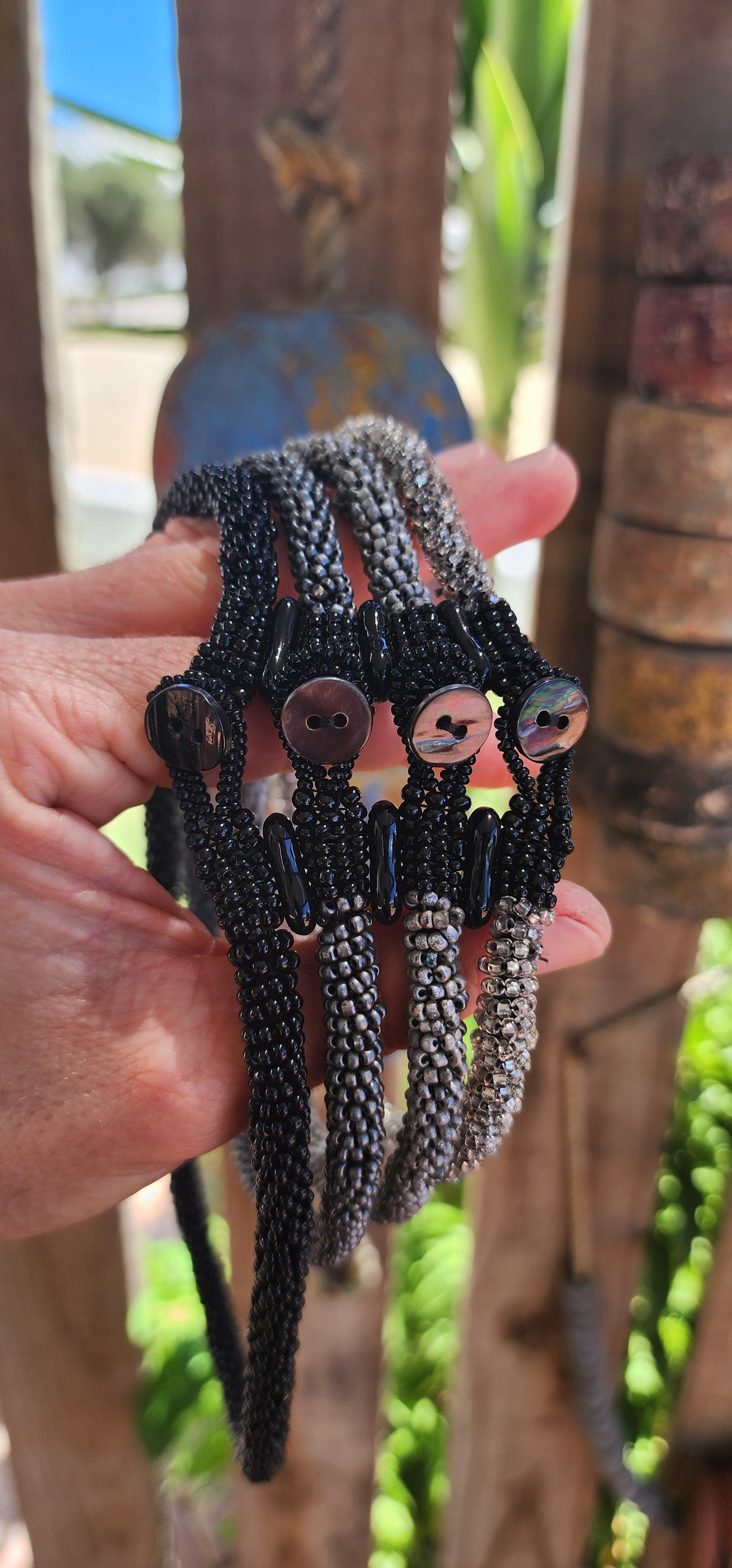 This stunning handcrafted choker necklace exemplifies artistry and meticulous craftsmanship, the result of countless hours of dedicated work.