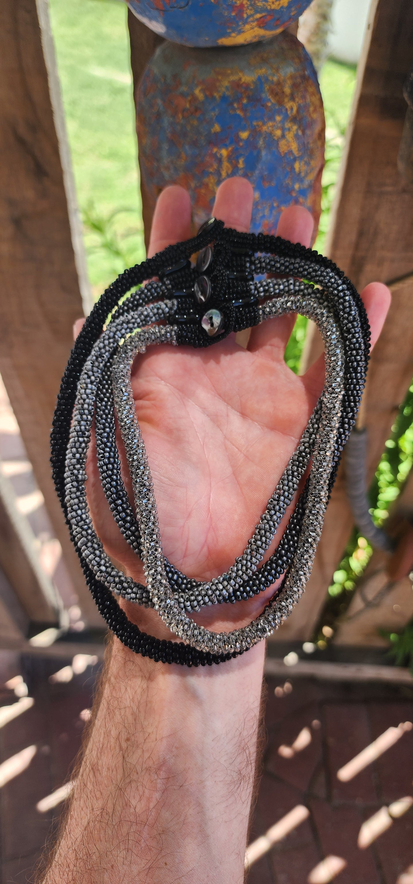 This stunning handcrafted choker necklace exemplifies artistry and meticulous craftsmanship, the result of countless hours of dedicated work.