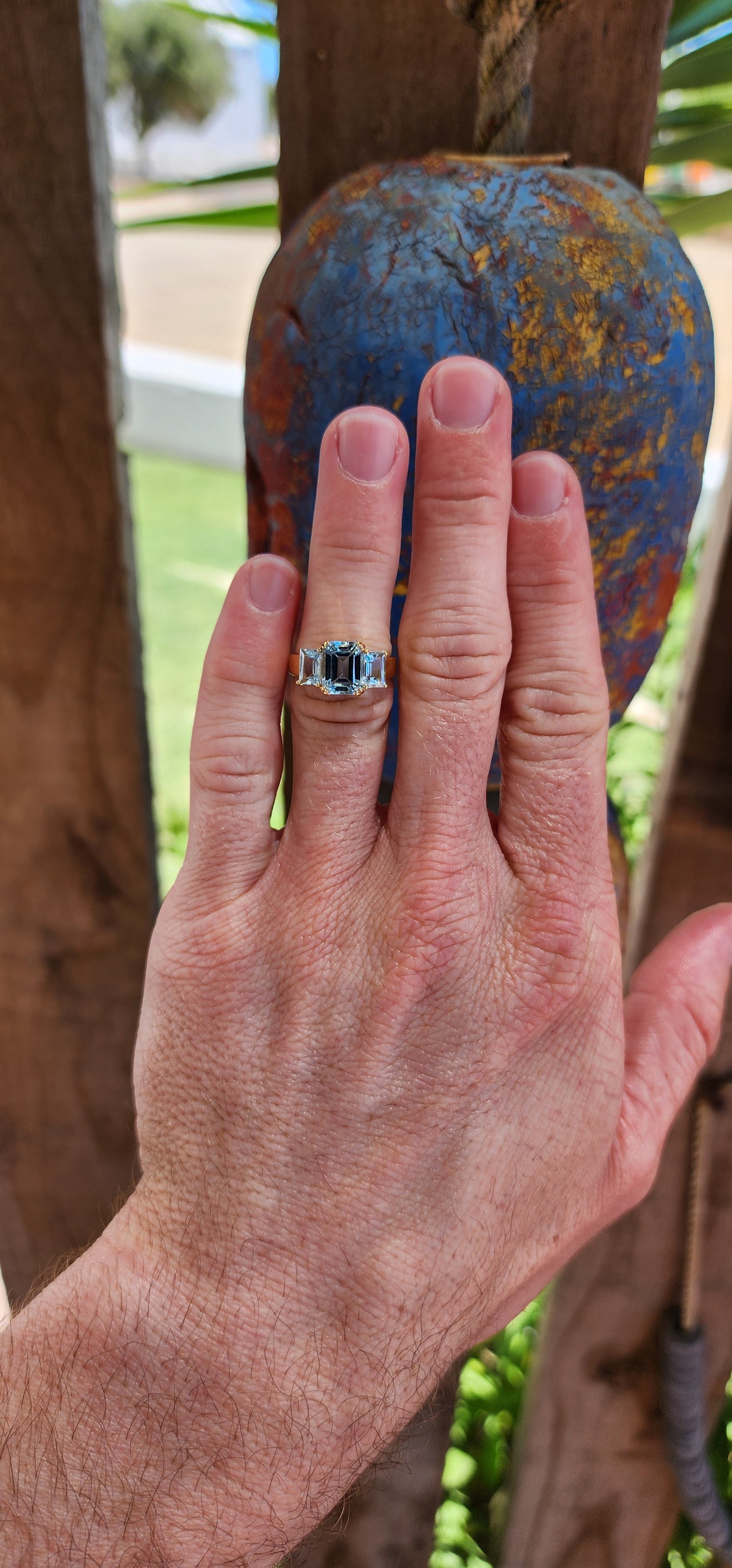 This extraordinary sterling silver trilogy ring, elegantly plated with 18ct yellow gold, radiates timeless sophistication and an ethereal charm.