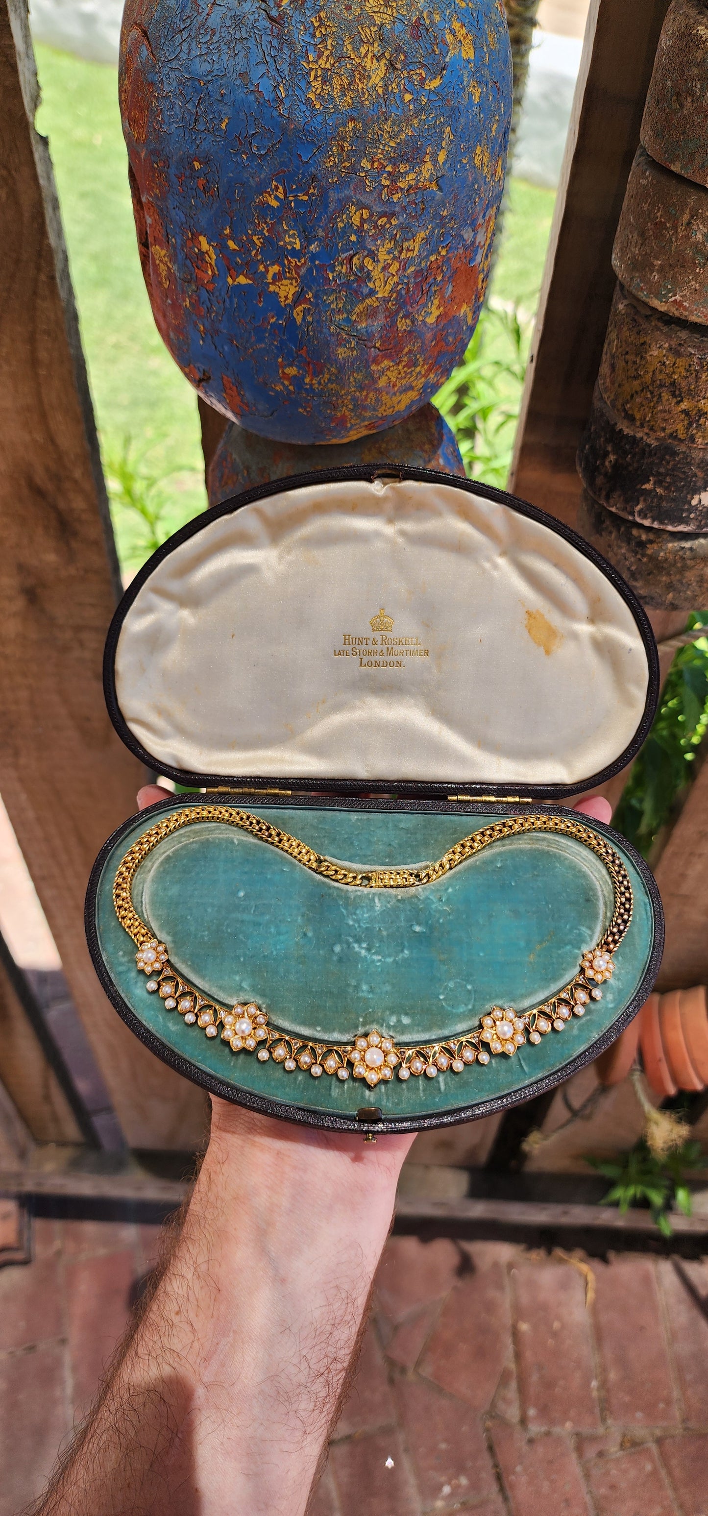 This magnificent antique necklace is a Victorian-era masterpiece crafted in solid 18ct yellow gold, featuring marine cultured pearls and old rose-cut diamonds.