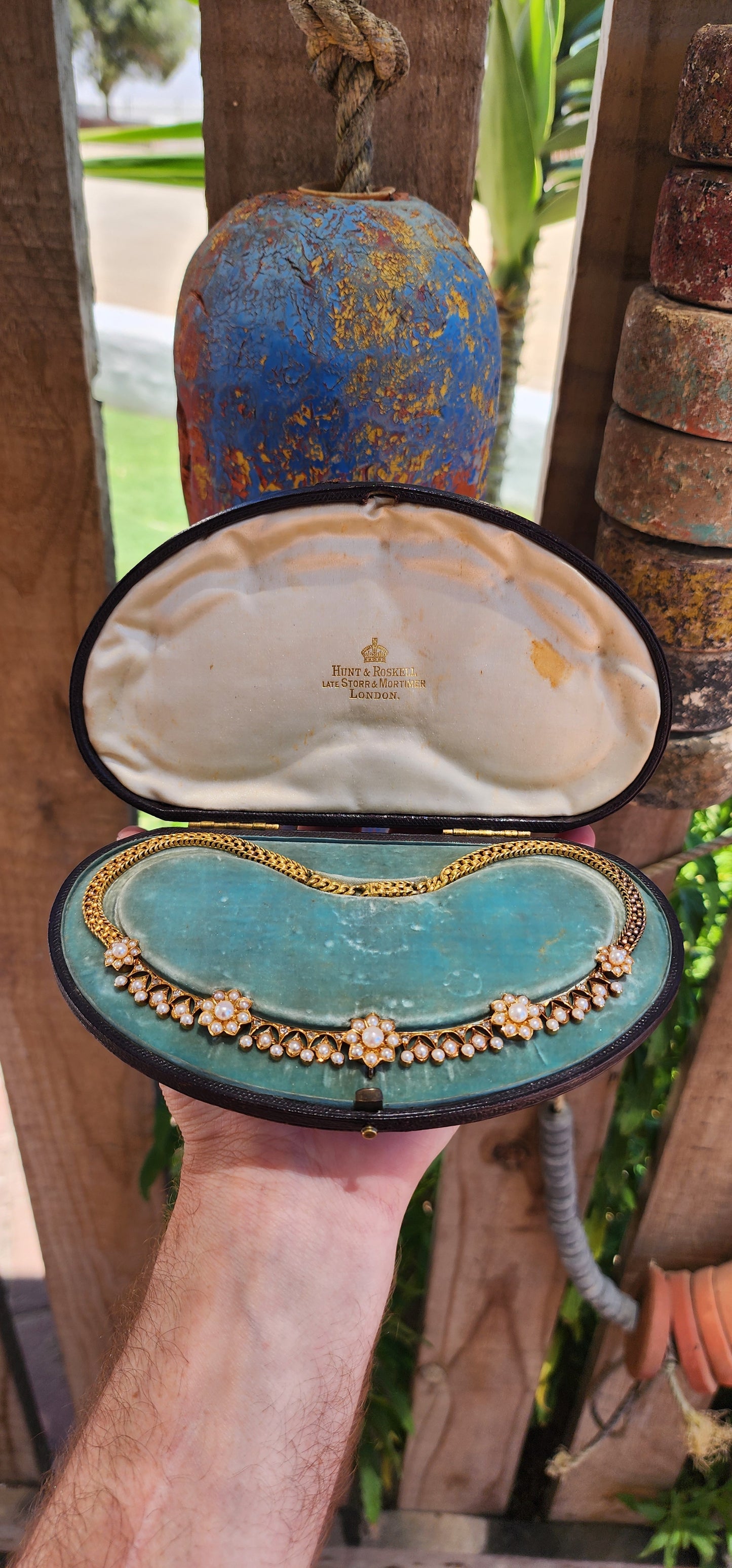 This magnificent antique necklace is a Victorian-era masterpiece crafted in solid 18ct yellow gold, featuring marine cultured pearls and old rose-cut diamonds.