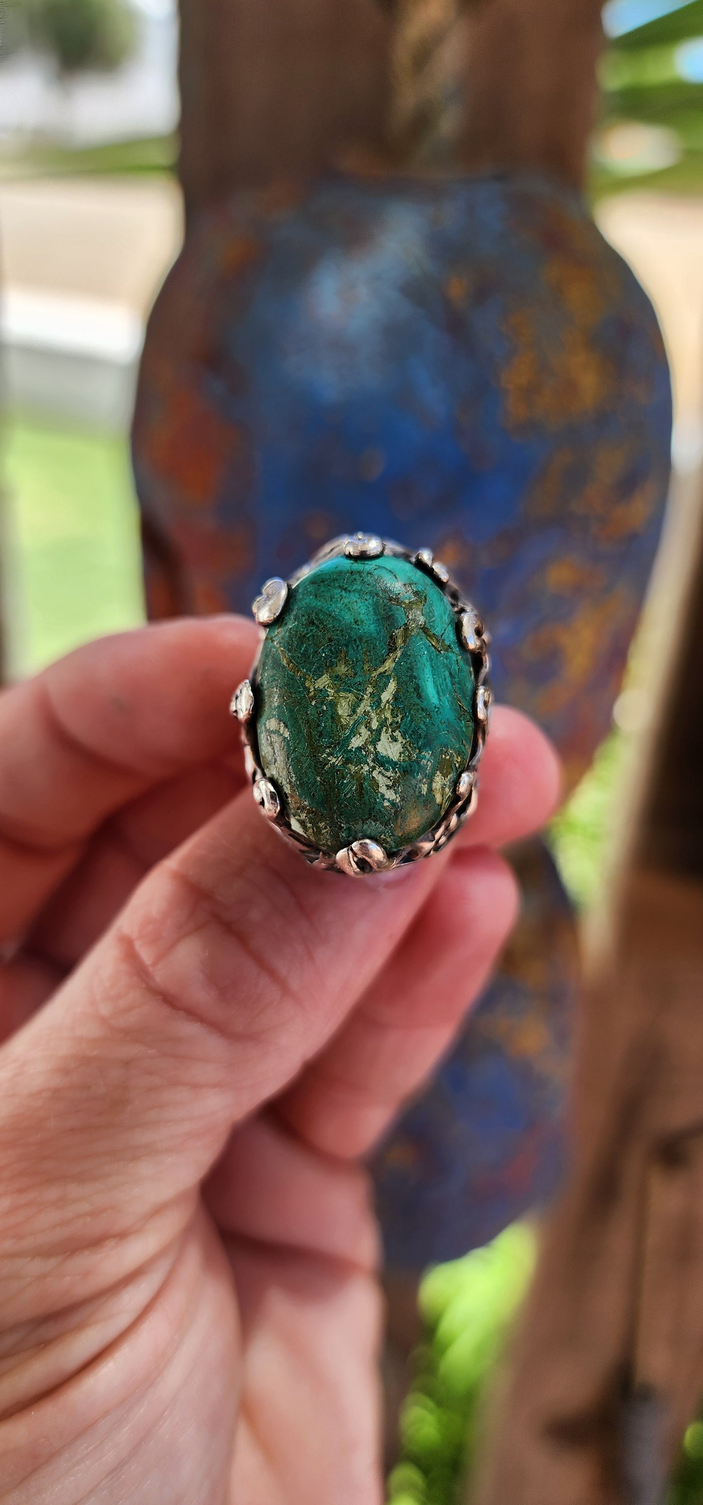 This vintage unisex artisan-crafted sterling silver ring is a masterpiece of raw, elemental beauty, evoking the essence of a mystical artifact forged by ancient hands.