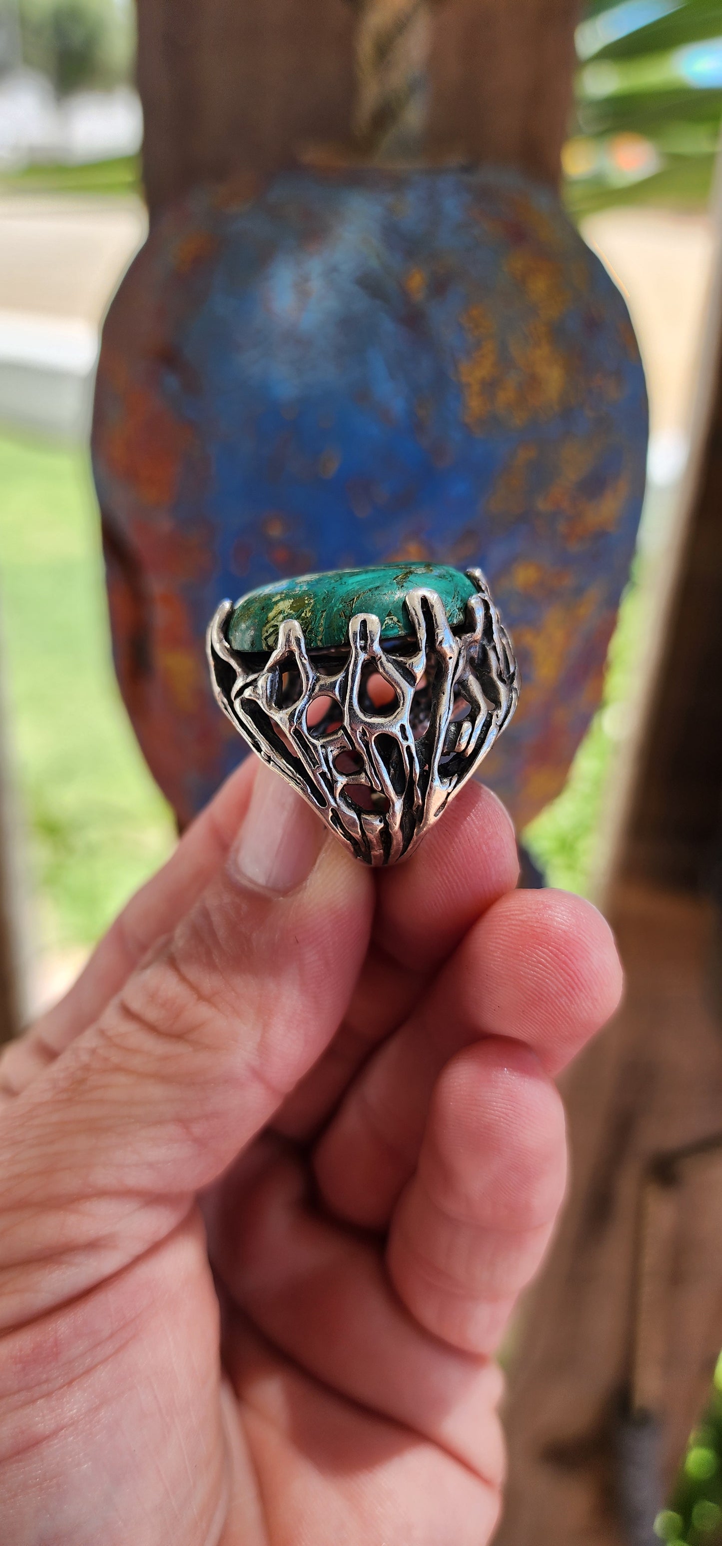 This vintage unisex artisan-crafted sterling silver ring is a masterpiece of raw, elemental beauty, evoking the essence of a mystical artifact forged by ancient hands.