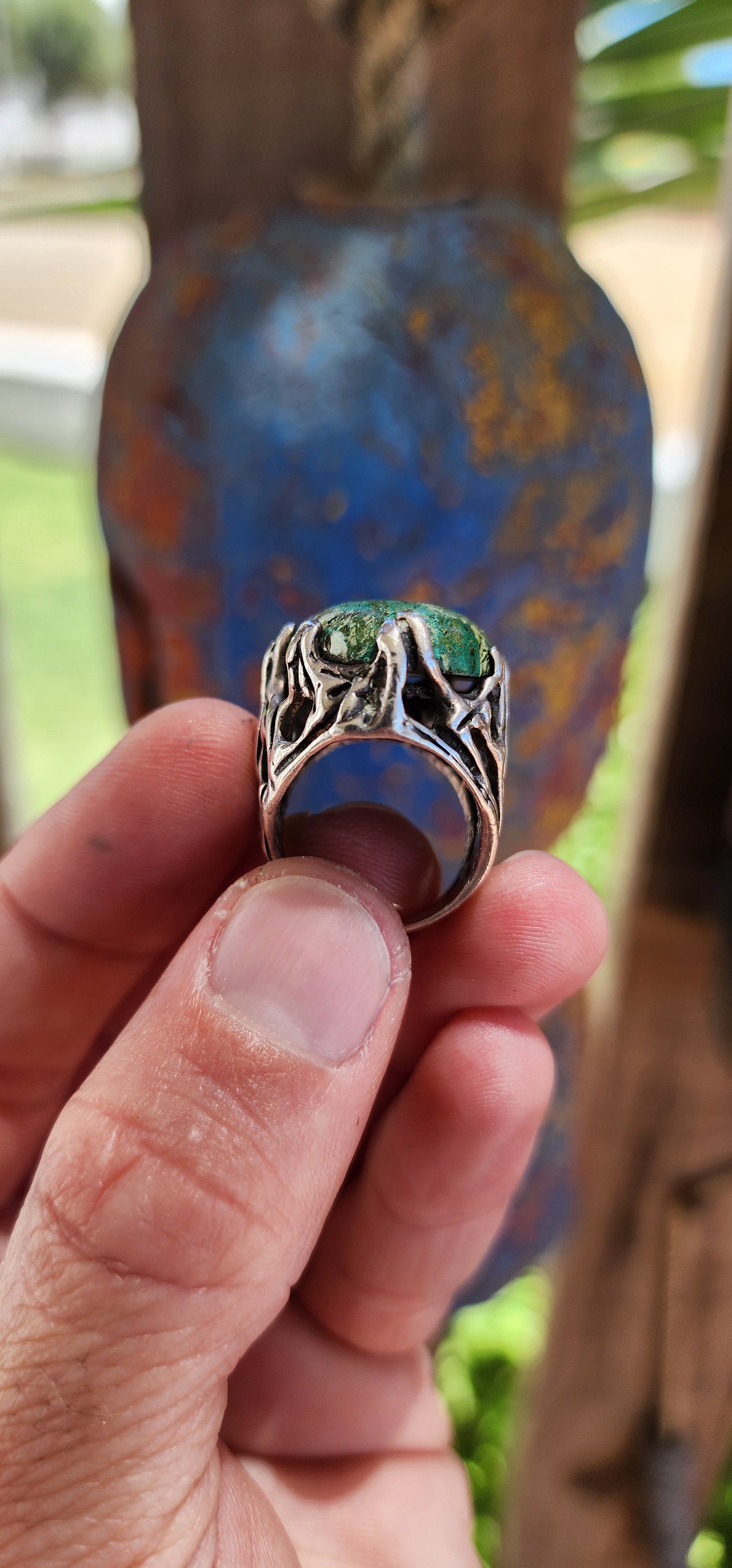 This vintage unisex artisan-crafted sterling silver ring is a masterpiece of raw, elemental beauty, evoking the essence of a mystical artifact forged by ancient hands.