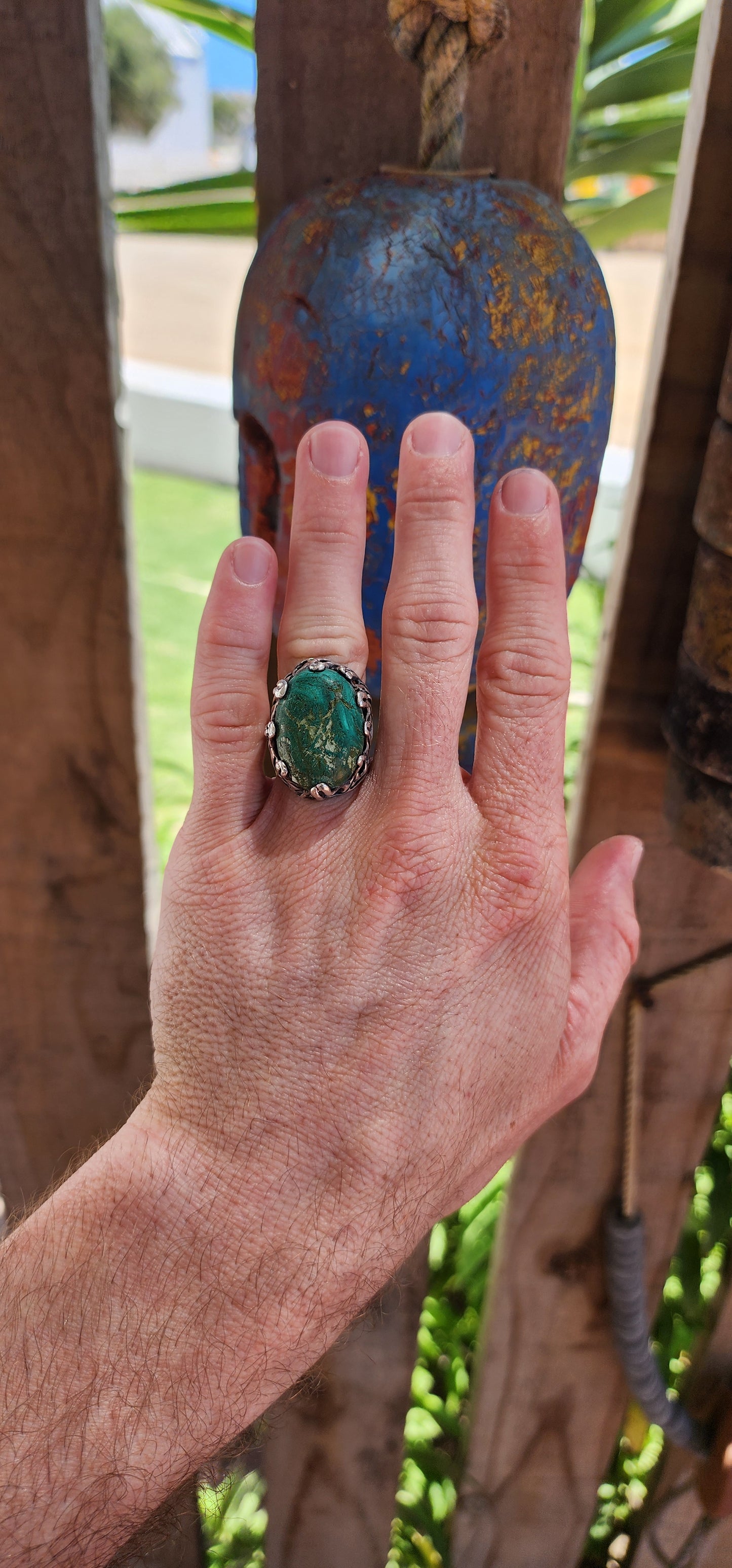 This vintage unisex artisan-crafted sterling silver ring is a masterpiece of raw, elemental beauty, evoking the essence of a mystical artifact forged by ancient hands.