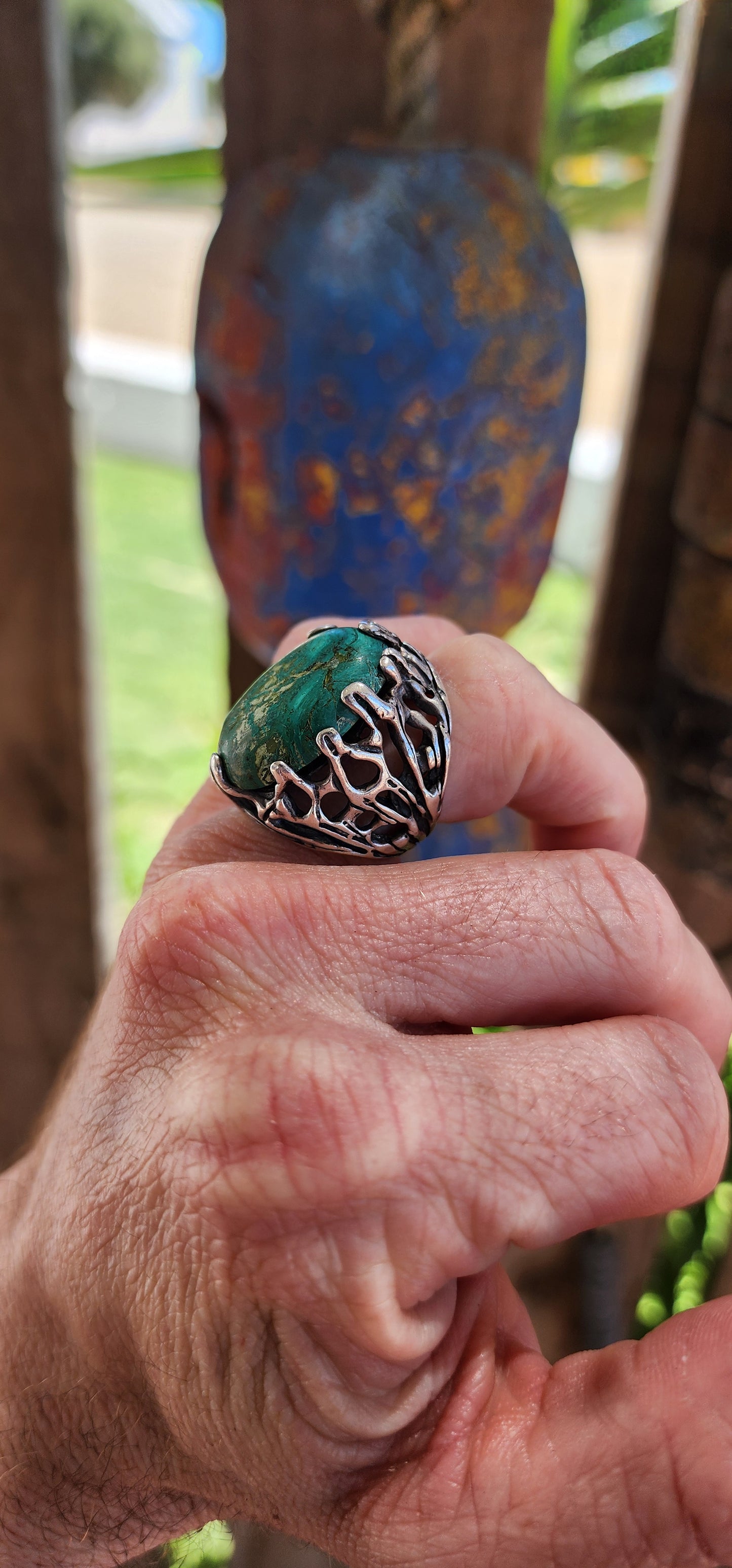 This vintage unisex artisan-crafted sterling silver ring is a masterpiece of raw, elemental beauty, evoking the essence of a mystical artifact forged by ancient hands.