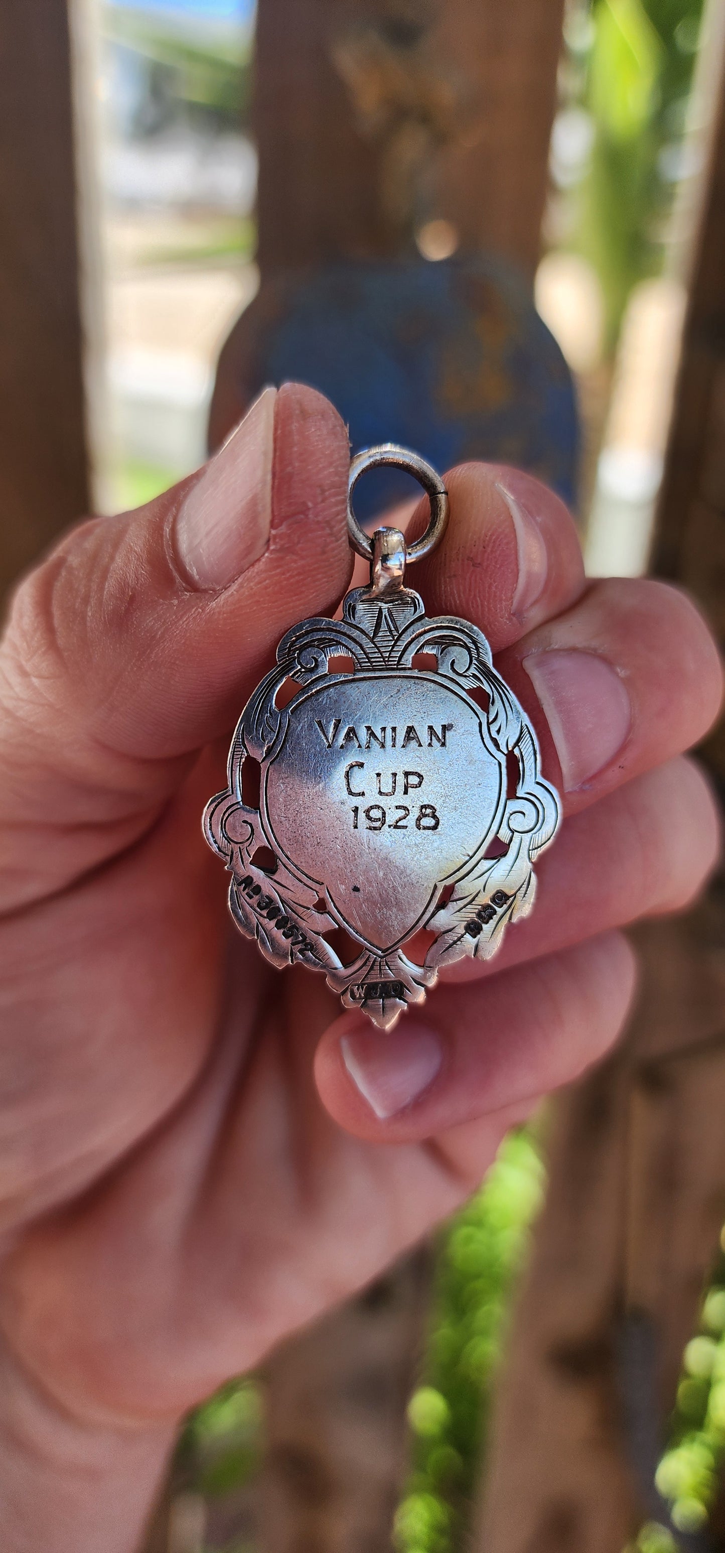 This exquisite and highly detailed hallmarked sterling silver fob pendant, crafted by the renowned silversmith William James Dingley, is an outstanding example of early 20th-century British silverwork.