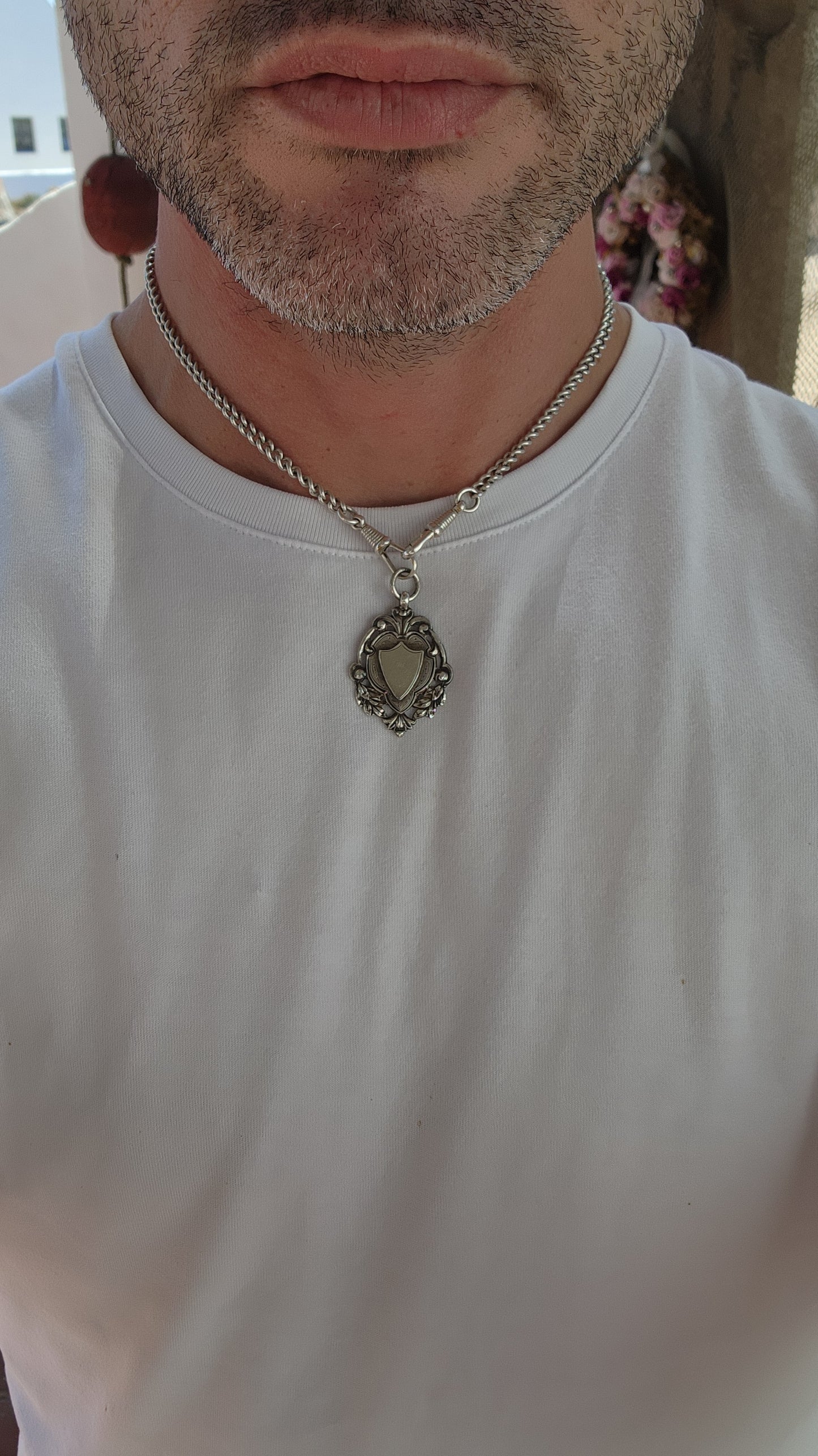 This exquisite and highly detailed hallmarked sterling silver fob pendant, crafted by the renowned silversmith William James Dingley, is an outstanding example of early 20th-century British silverwork.