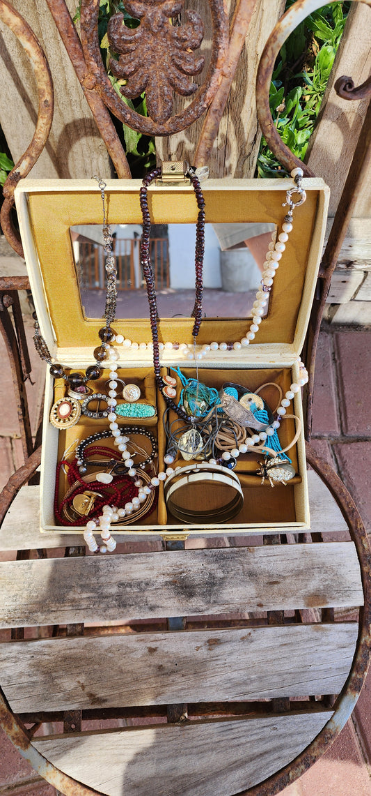 The Restorer's Chest of Dreams!
Step into a world of hidden treasures and forgotten beauties! This vintage jewelry chest is a time capsule filled with unique and exquisite pieces, each waiting for a little love and restoration to shine once more.