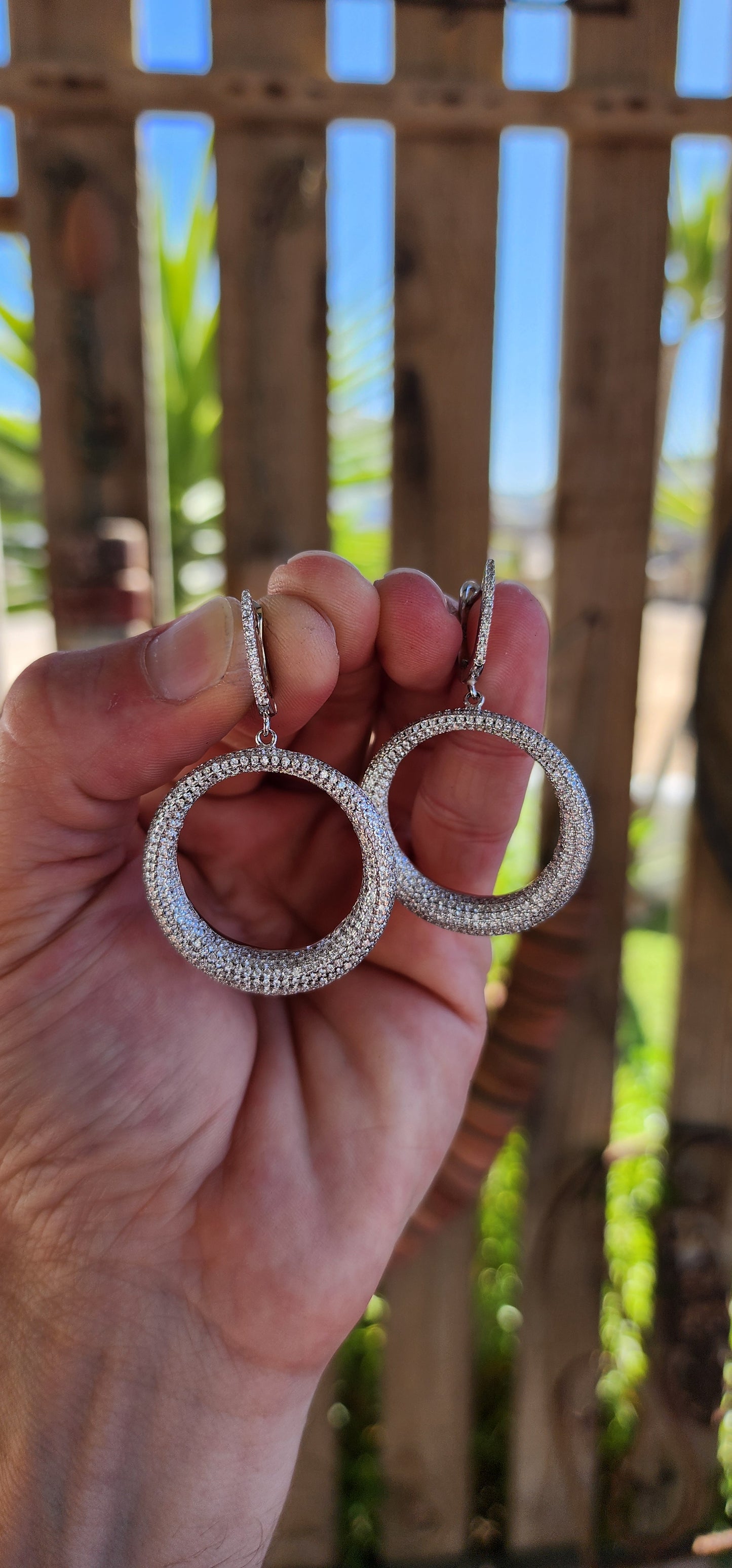 These breathtaking sterling silver statement drop earrings embody the perfect harmony of classical refinement and contemporary charm.