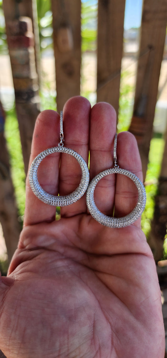 These breathtaking sterling silver statement drop earrings embody the perfect harmony of classical refinement and contemporary charm.