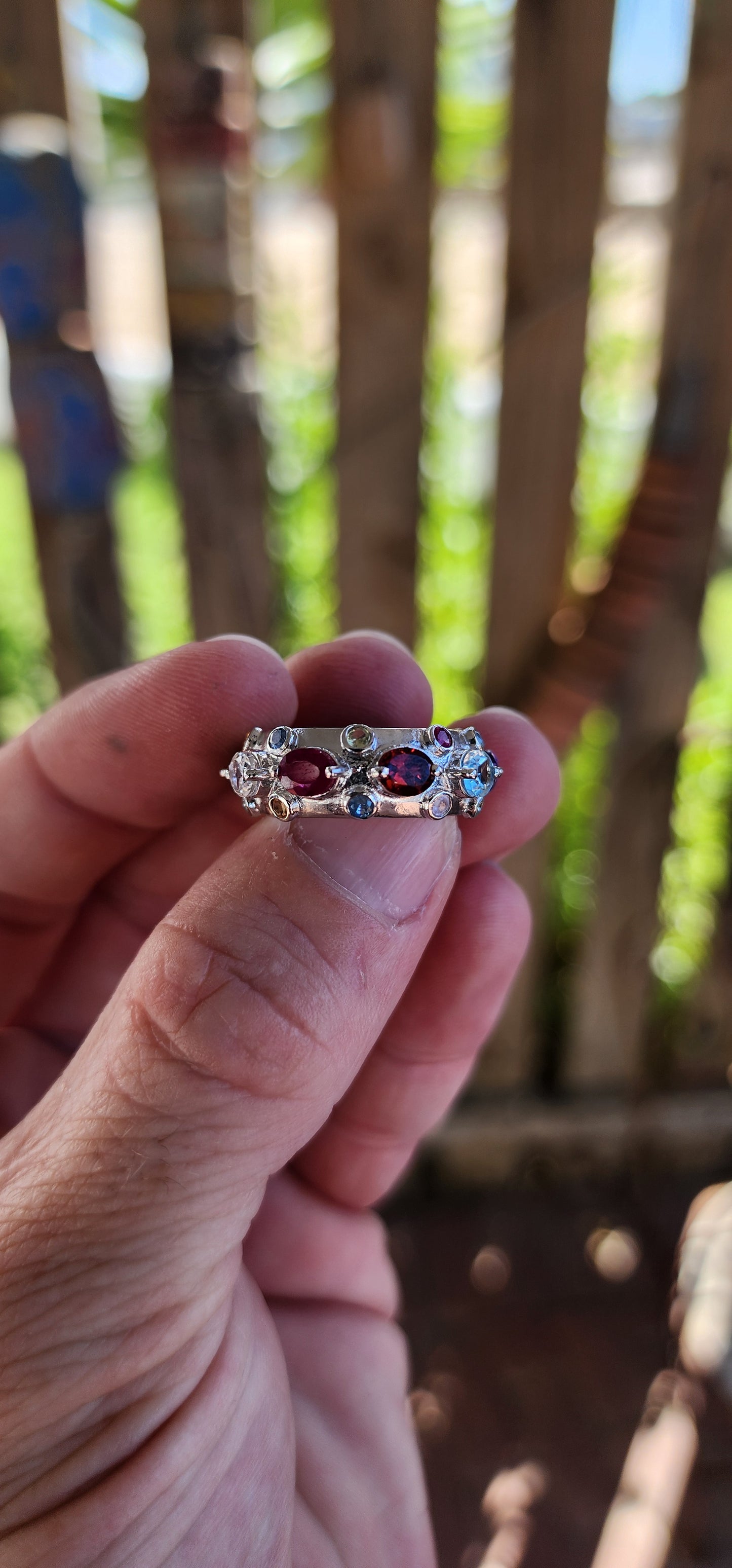 This Tutti Frutti Full Eternity Cocktail Ring is a riot of color, an exquisite fusion of light and energy, crafted in solid sterling silver and adorned with a spectacular array of natural gemstones.