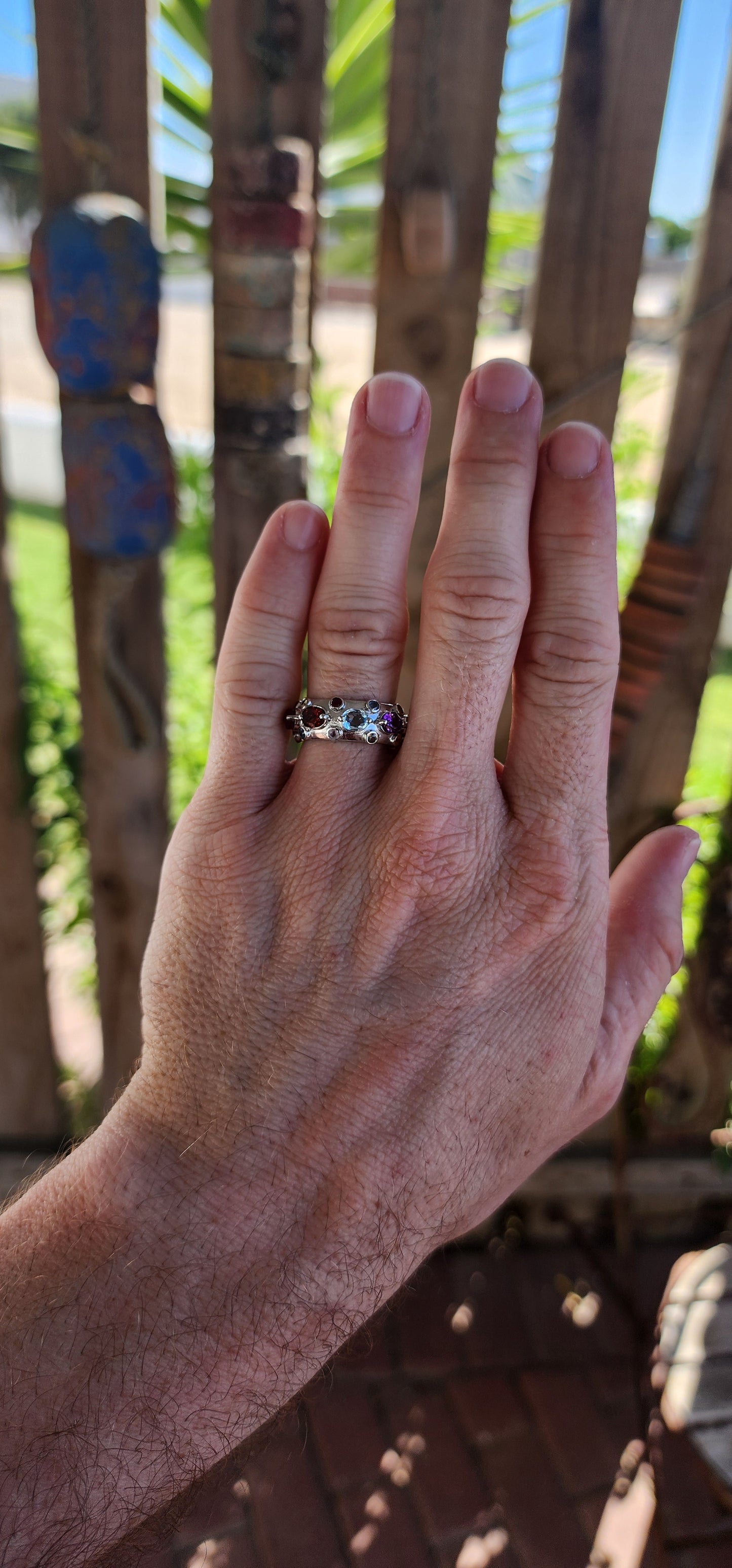 This Tutti Frutti Full Eternity Cocktail Ring is a riot of color, an exquisite fusion of light and energy, crafted in solid sterling silver and adorned with a spectacular array of natural gemstones.