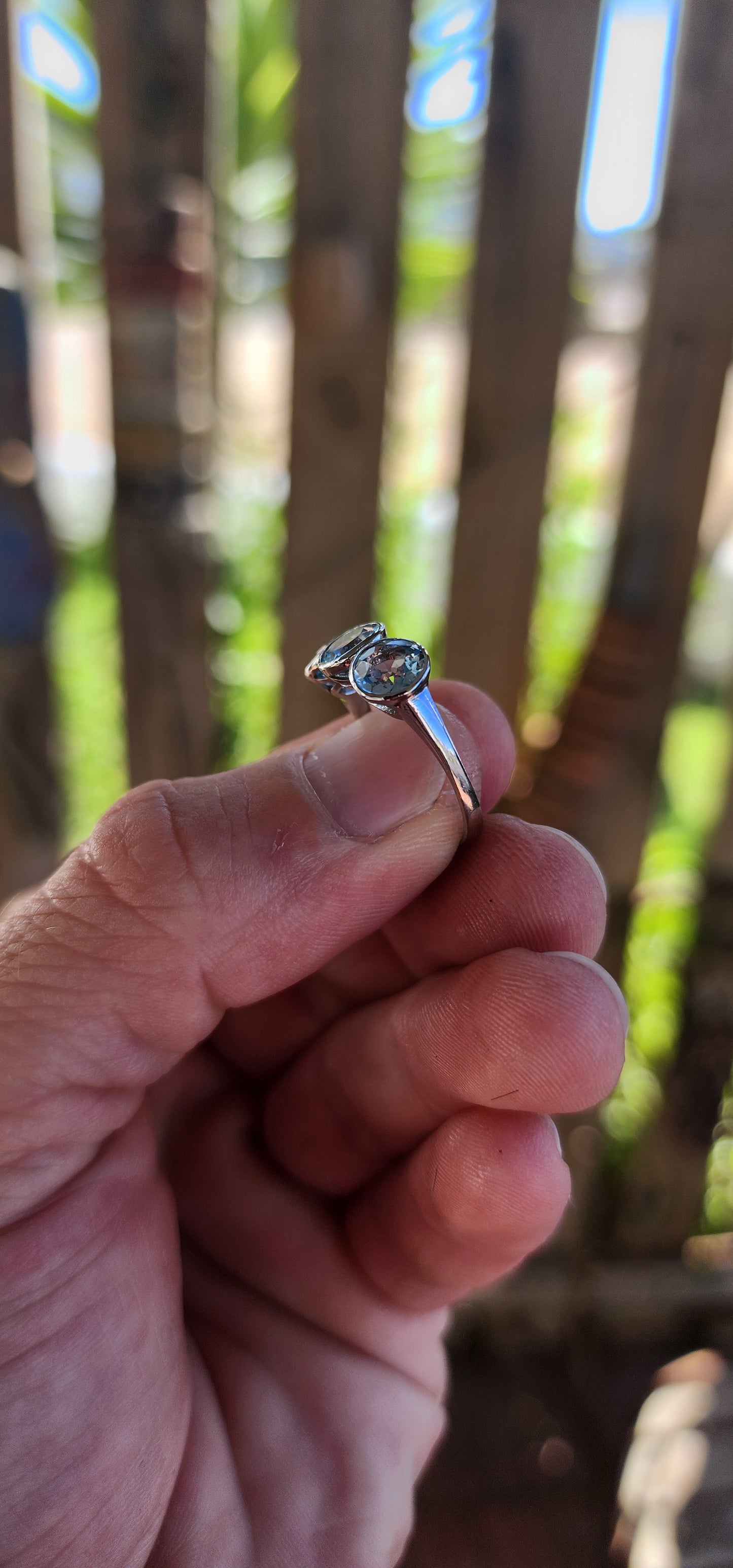 This Sterling Silver and Sky Blue Topaz Trilogy Ring is a true embodiment of timeless elegance, capturing the serene beauty of a clear sky on a perfect day.