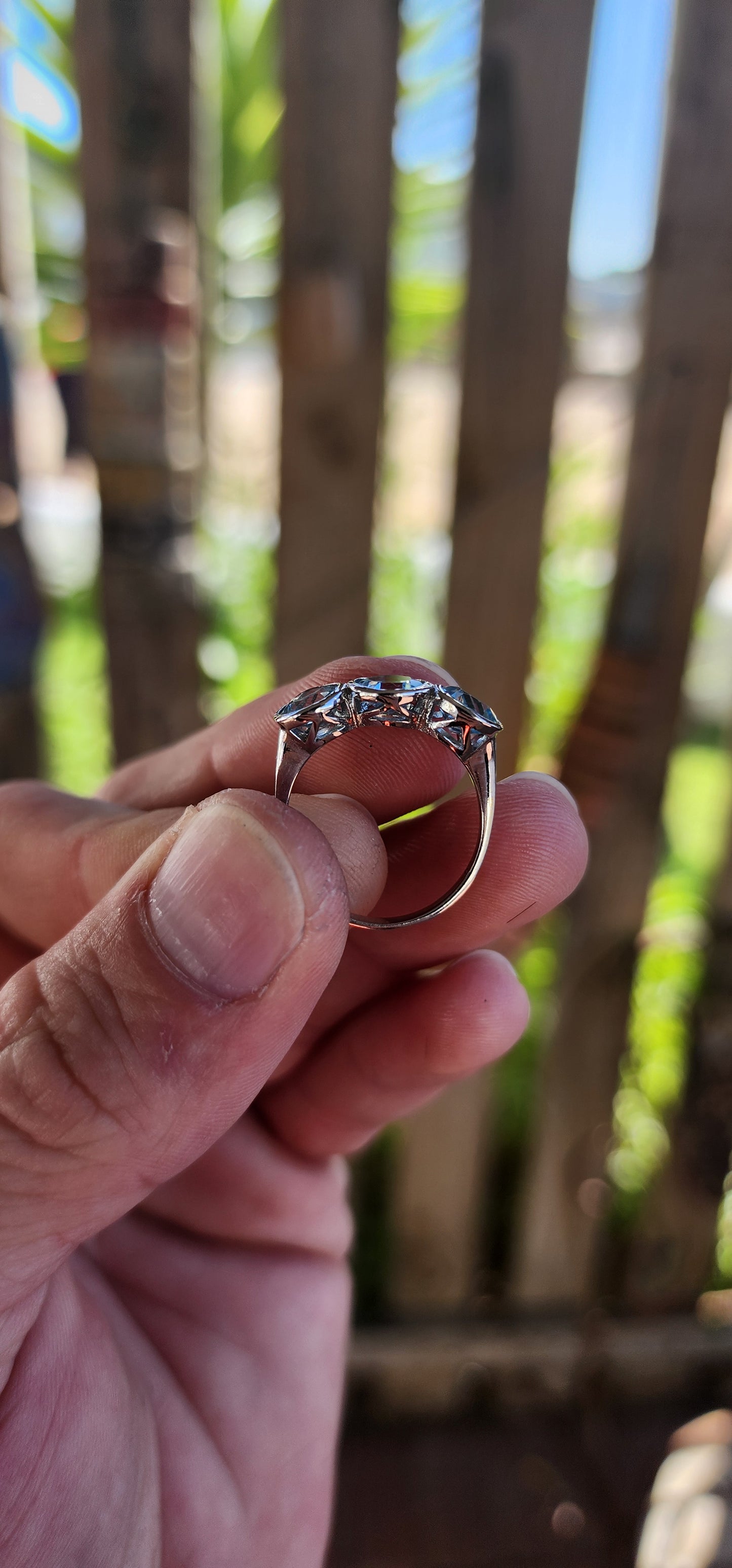 This Sterling Silver and Sky Blue Topaz Trilogy Ring is a true embodiment of timeless elegance, capturing the serene beauty of a clear sky on a perfect day.