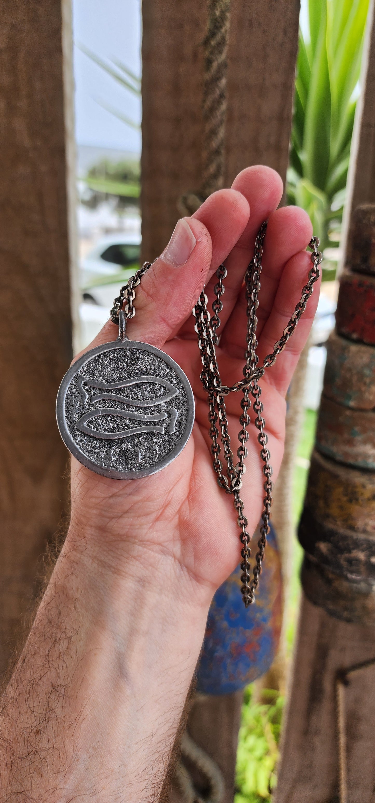 This vintage mid-century modernist pewter pendant, crafted by renowned Danish silversmith Jørgen Jensen, is a striking example of Scandinavian modernist jewelry.