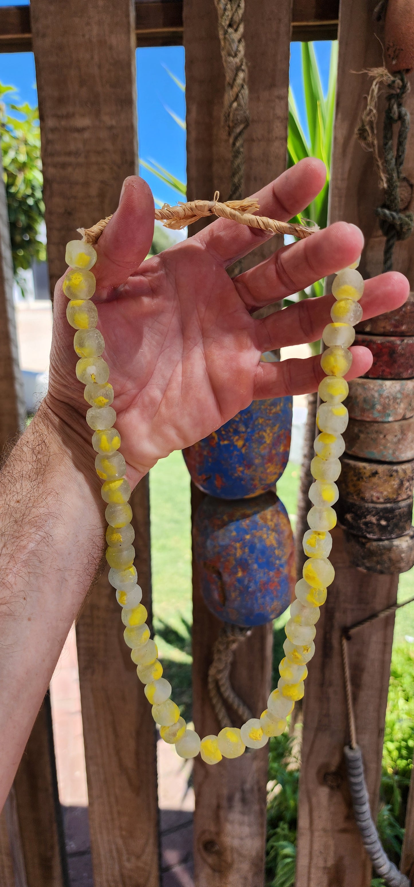 These chunky Krobo recycled glass necklaces are like little bursts of West African sunshine and ocean waves, captured in bead form.
