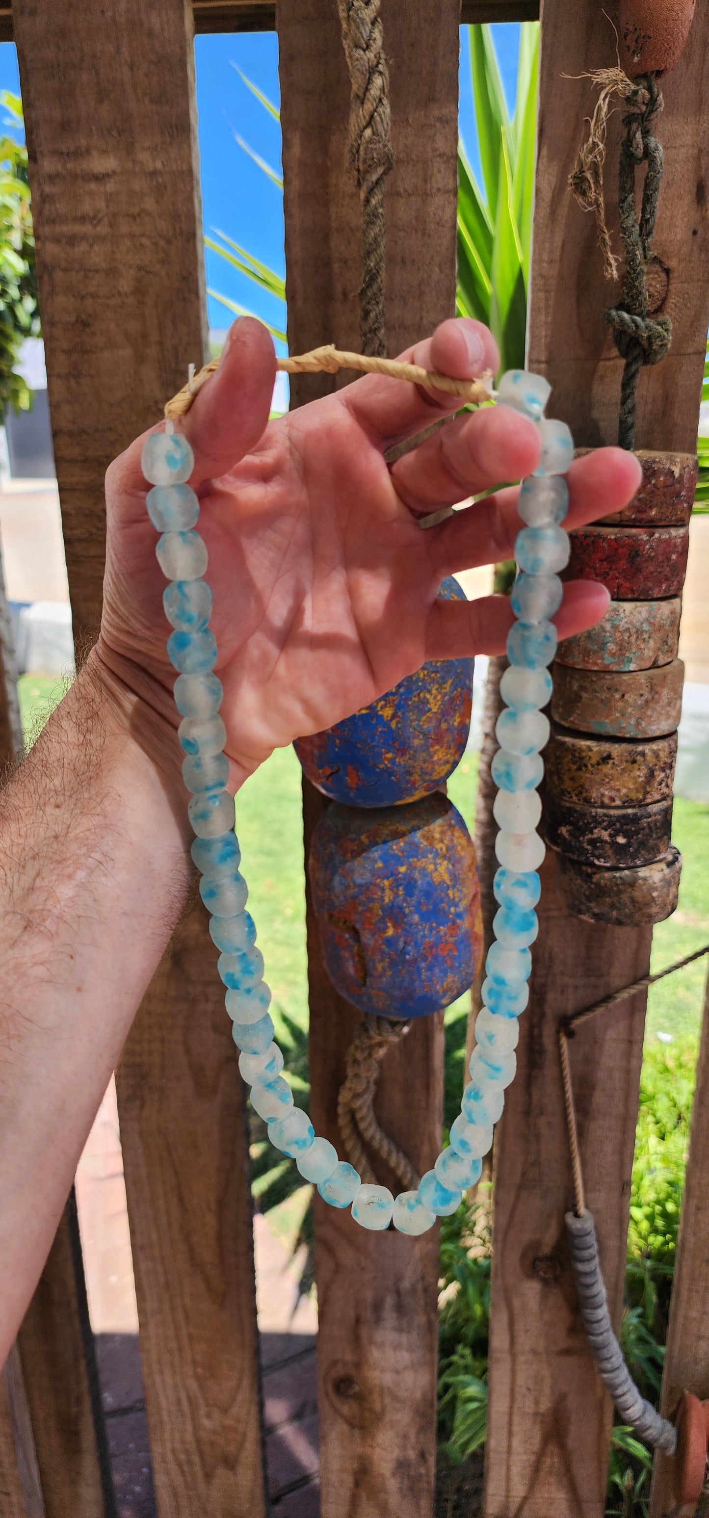 These chunky Krobo recycled glass necklaces are like little bursts of West African sunshine and ocean waves, captured in bead form.