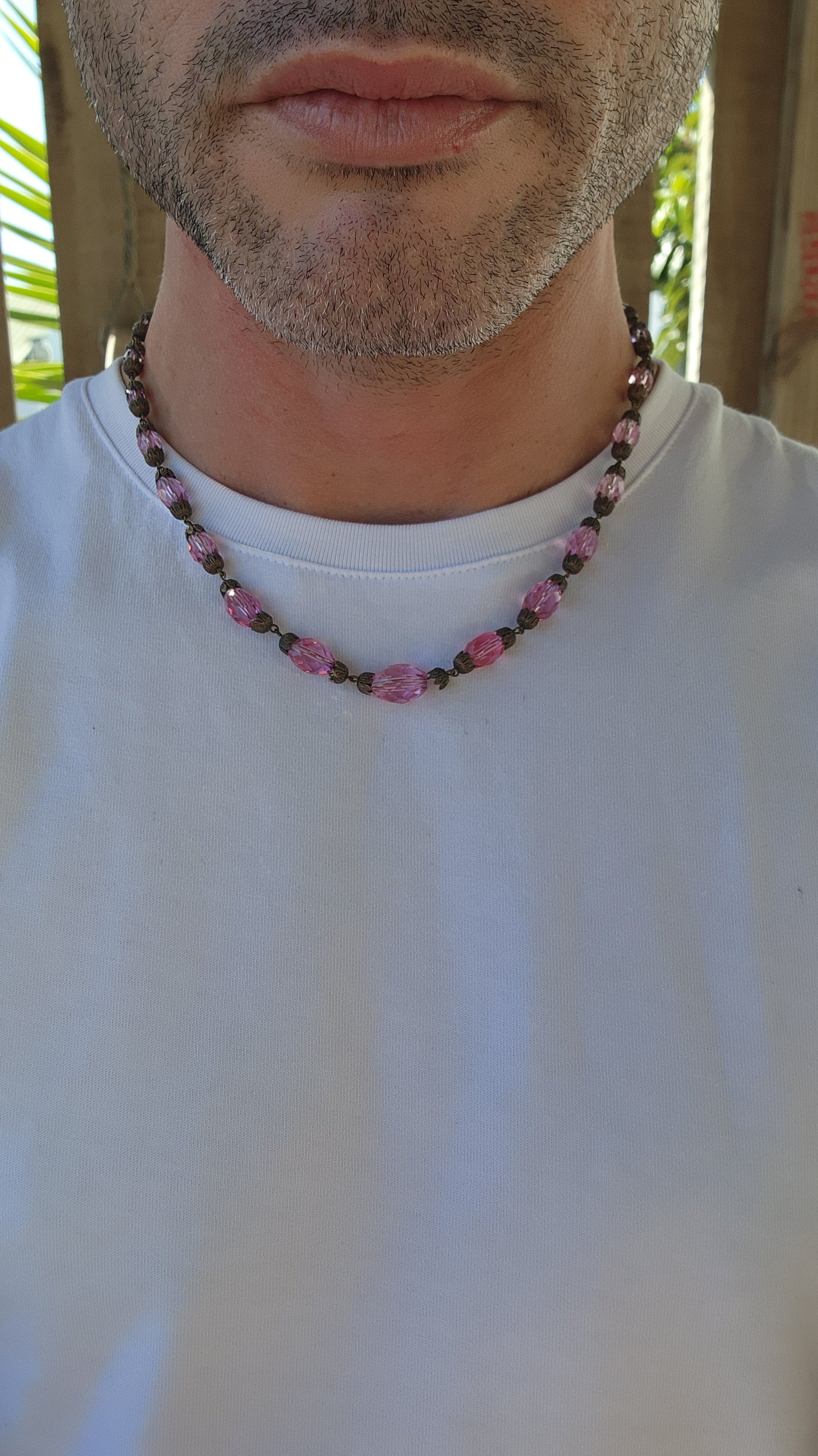 This exquisite antique 1920s Pink Czech crystal necklace is a delicate symphony of light and color, masterfully crafted with graduated faceted pink crystal beads that shimmer with every movement.