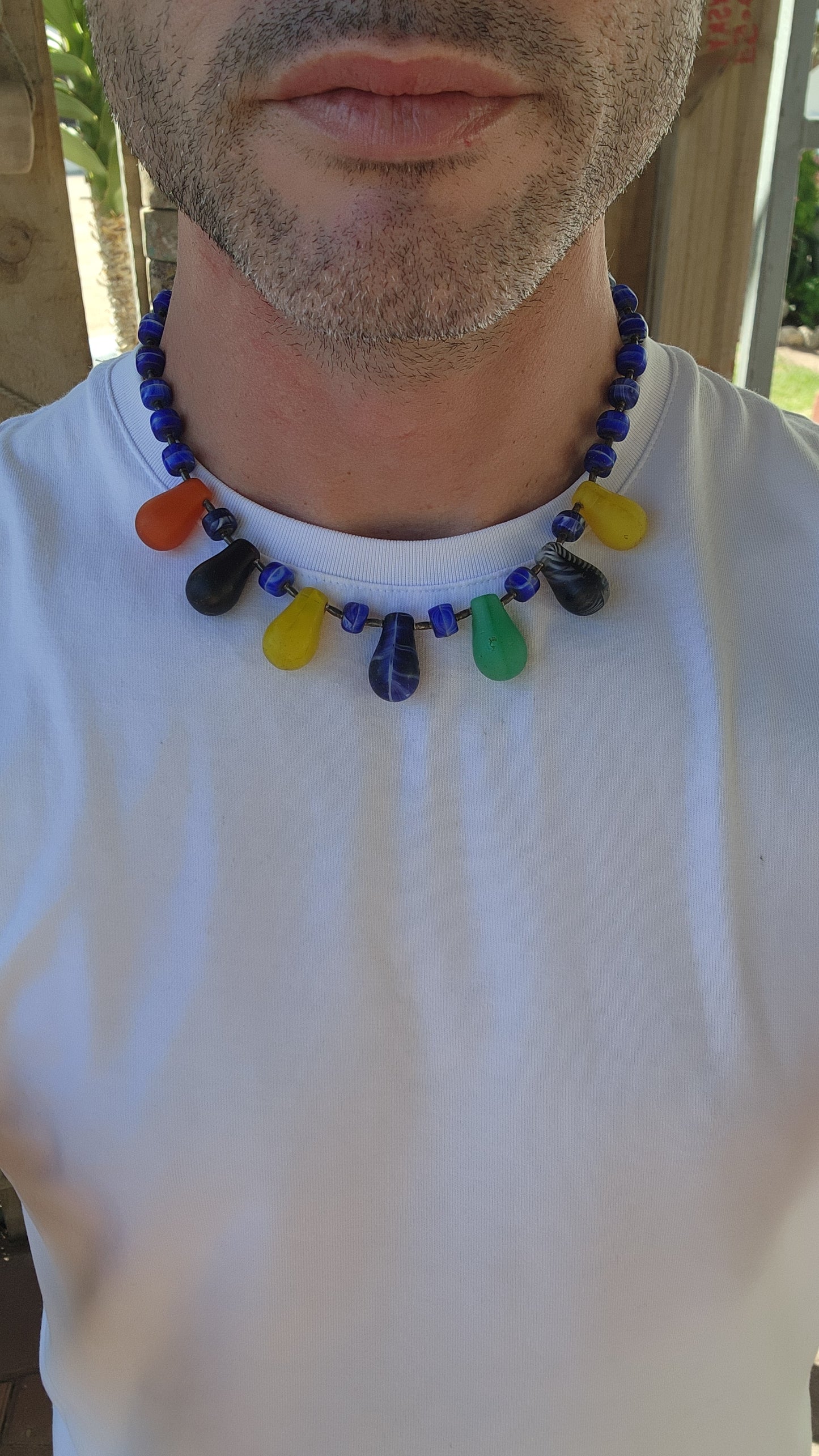 This Antique Early 1900s "Mali Wedding" Glass Beads Trade Necklace is a fascinating piece with a rich history rooted in the African trade and European glassmaking traditions.