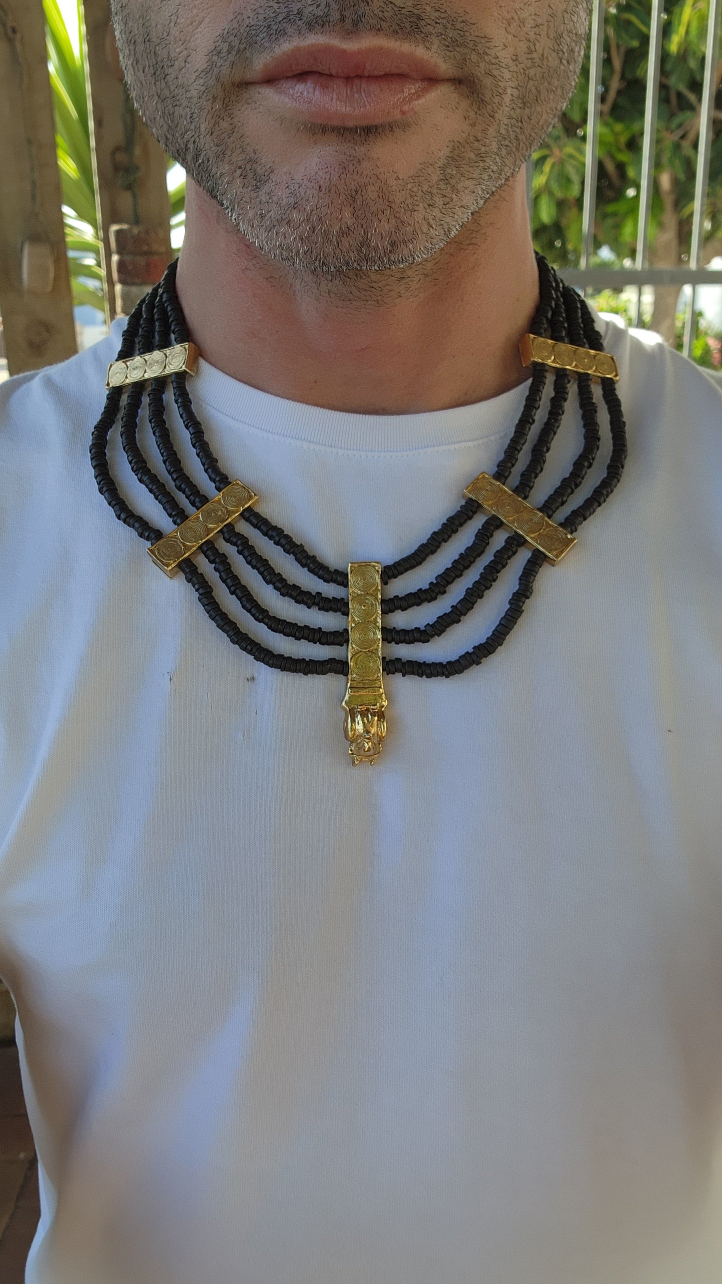 This marvelous Egyptian Revival collar necklace is a bold tribute to the splendor of ancient royalty, designed to grace the neck of a modern-day Cleopatra. Opulent yet commanding, its presence exudes power and wisdom.