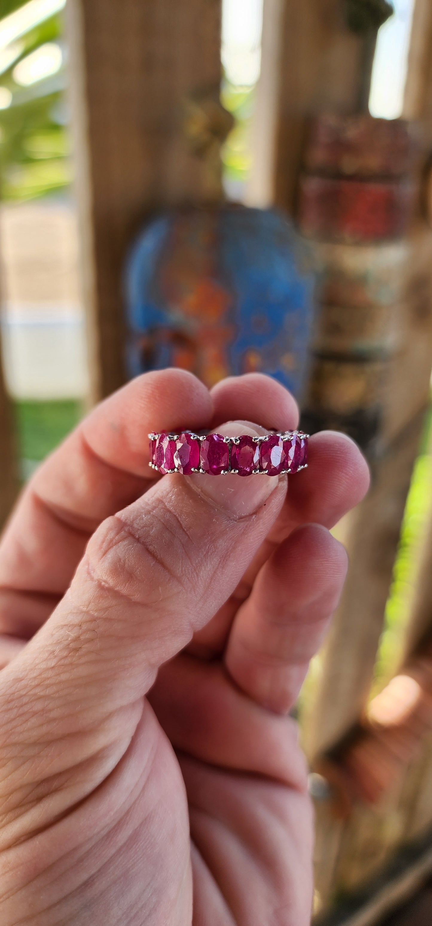 This eternity Ruby ring is a show-stopping piece of jewelry that balances elegance with a playful burst of color. Crafted from sterling silver, its full eternity design makes it a continuous circle of beauty, symbolizing everlasting love or commitment.