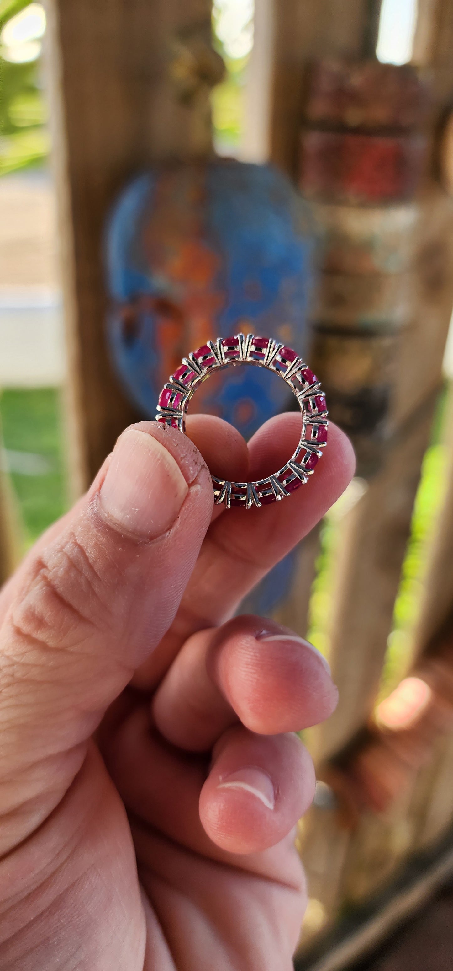 This eternity Ruby ring is a show-stopping piece of jewelry that balances elegance with a playful burst of color. Crafted from sterling silver, its full eternity design makes it a continuous circle of beauty, symbolizing everlasting love or commitment.