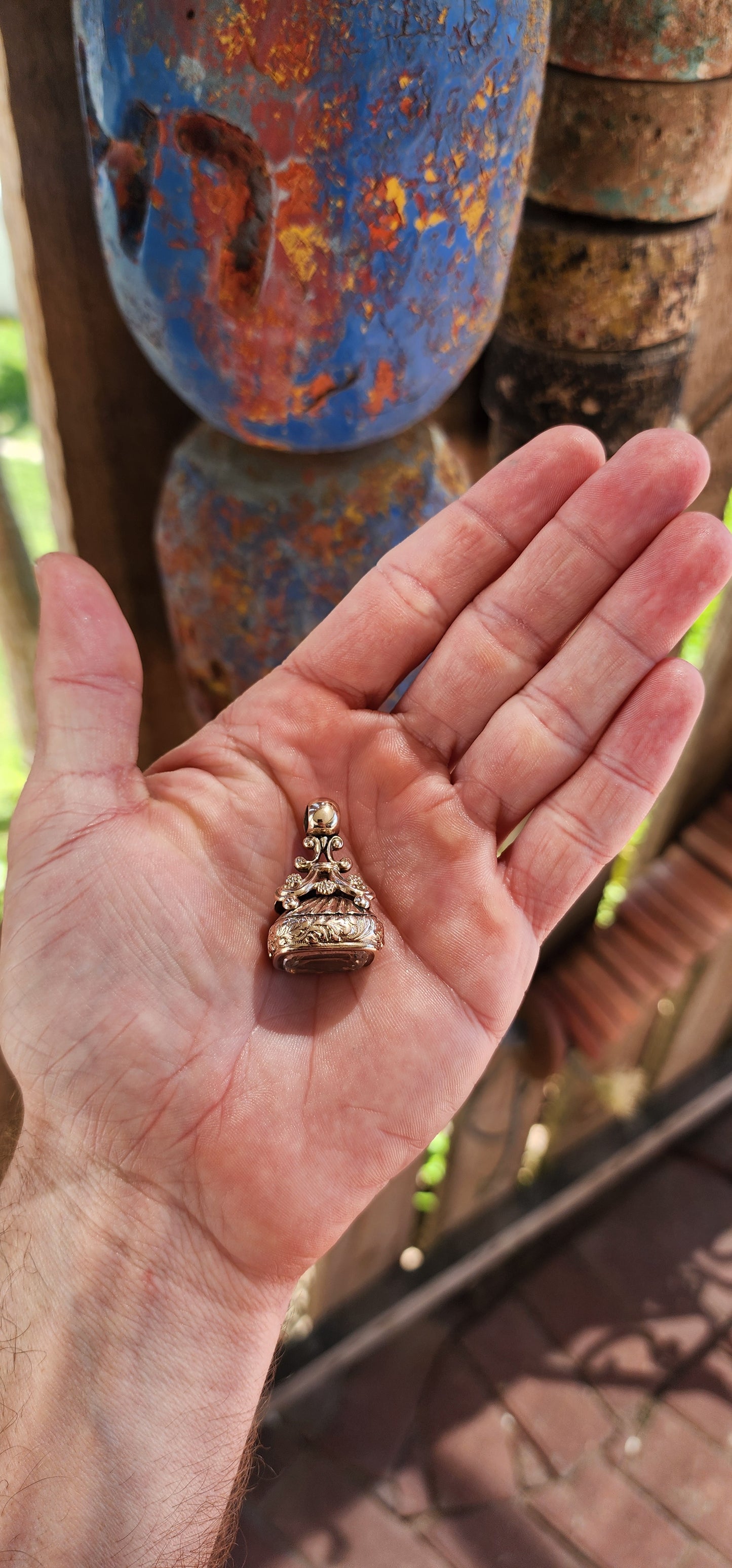 This large-sized Victorian 9ct rose gold fob seal pendant is a stunning relic of the mid-to-late 19th century, embodying both artistic mastery and functional elegance.